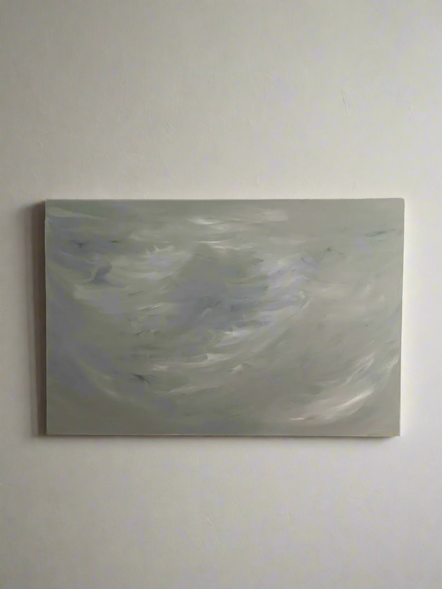 The "Veil of Tranquility" painting by Mattias Storm adorns a white wall, featuring abstract brushstrokes in muted gray, white, and light blue tones that evoke a sense of calm and movement.