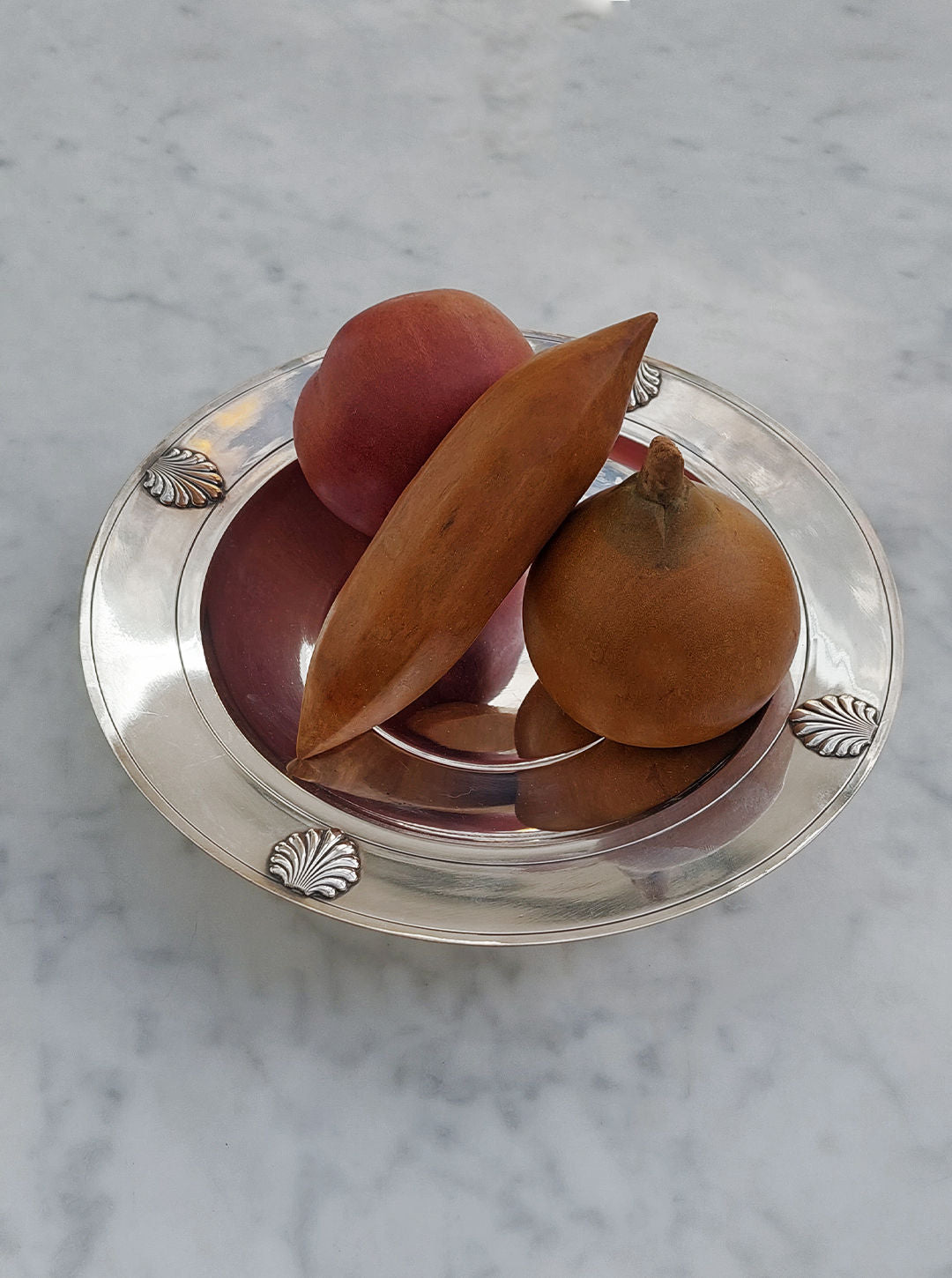Beautiful silver-plated cake stand with intricate floral design and elegant detailing