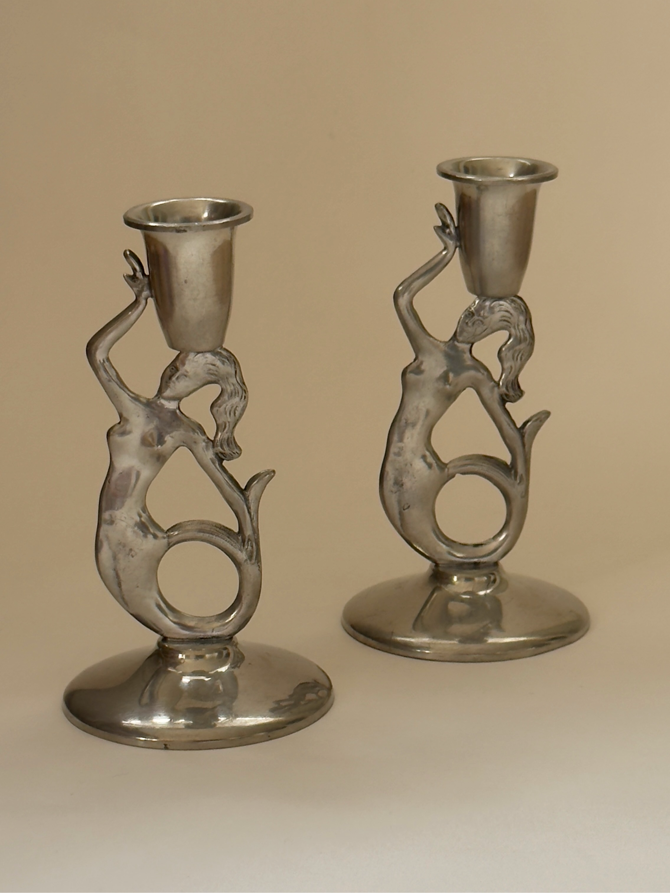 Bougeoirs Sirène en étain Art Déco
