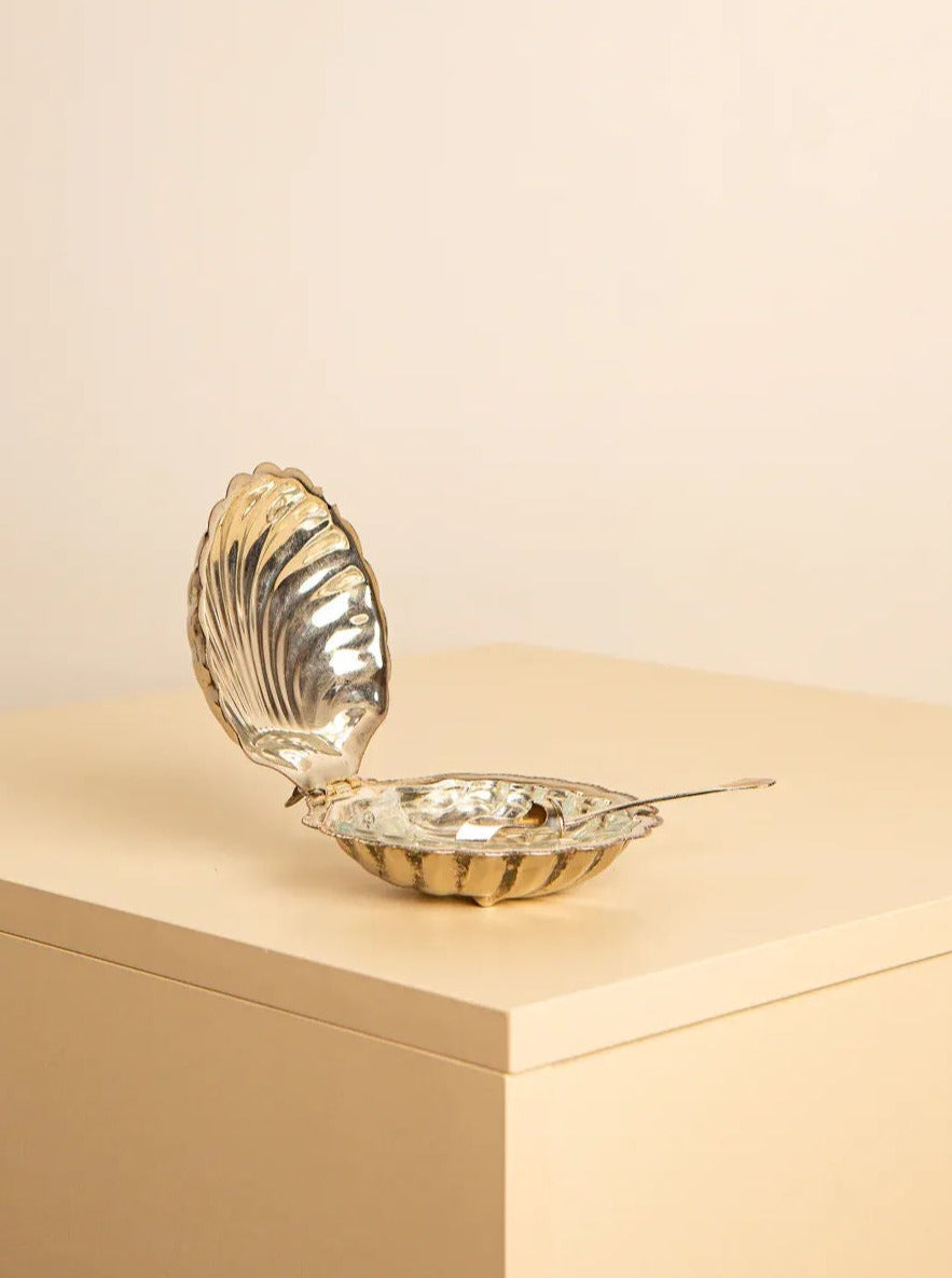 White ceramic shell shape butter dish with lid and textured surface