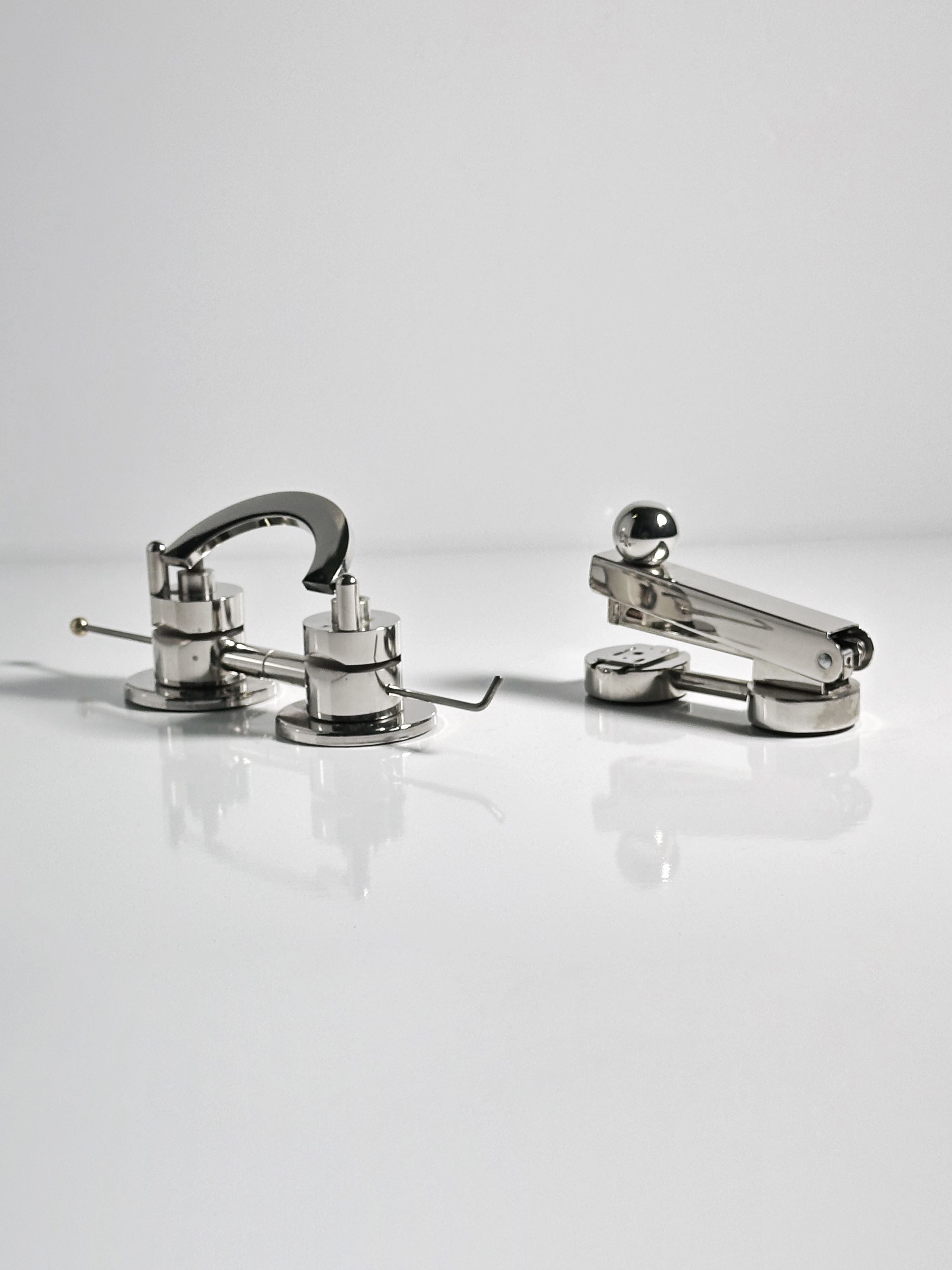 Chrome Art Deco desk set with curved faucet-style lamp and accessories