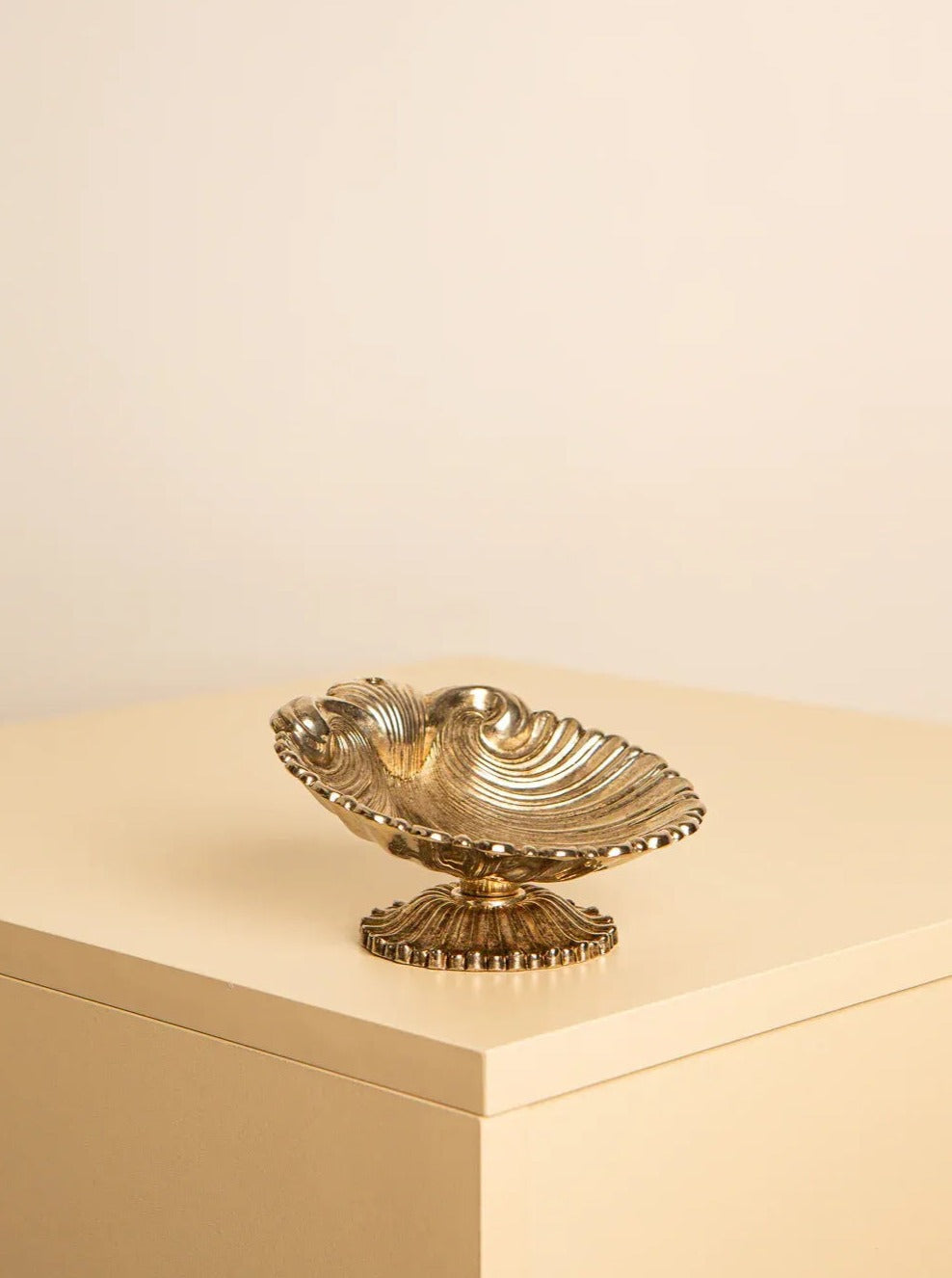 Italian metal shell dish from the 60's, featuring intricate decorative details and elegant craftsmanship