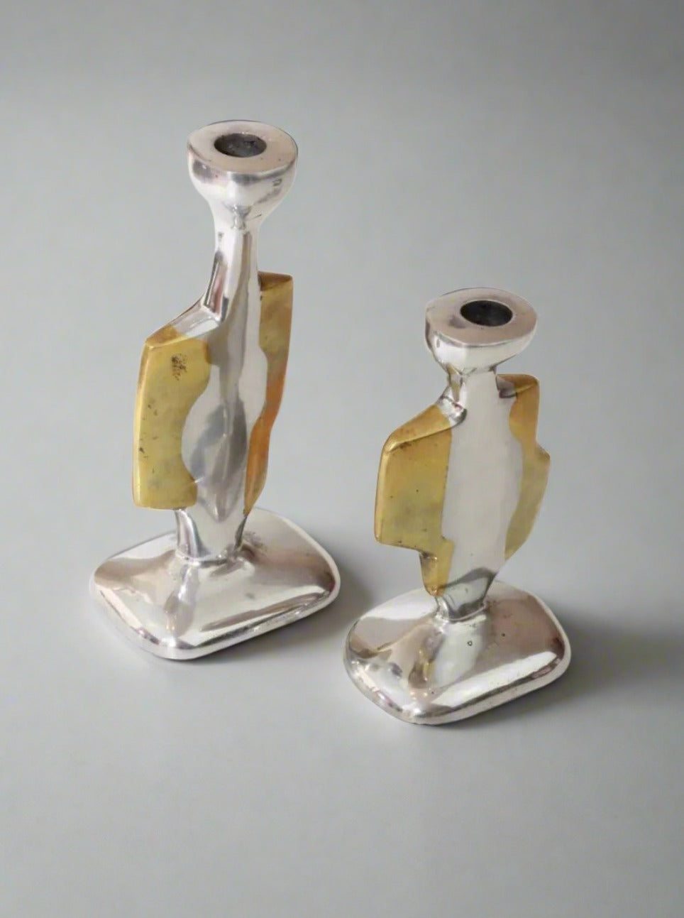 Pair of Brutalist candleholders, handcrafted iron with a rustic finish