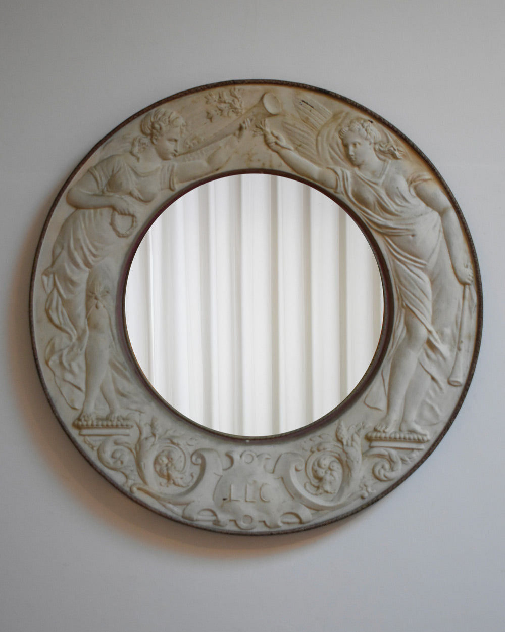 Round Embossed Metal Sheet Mirror, 1910s.
