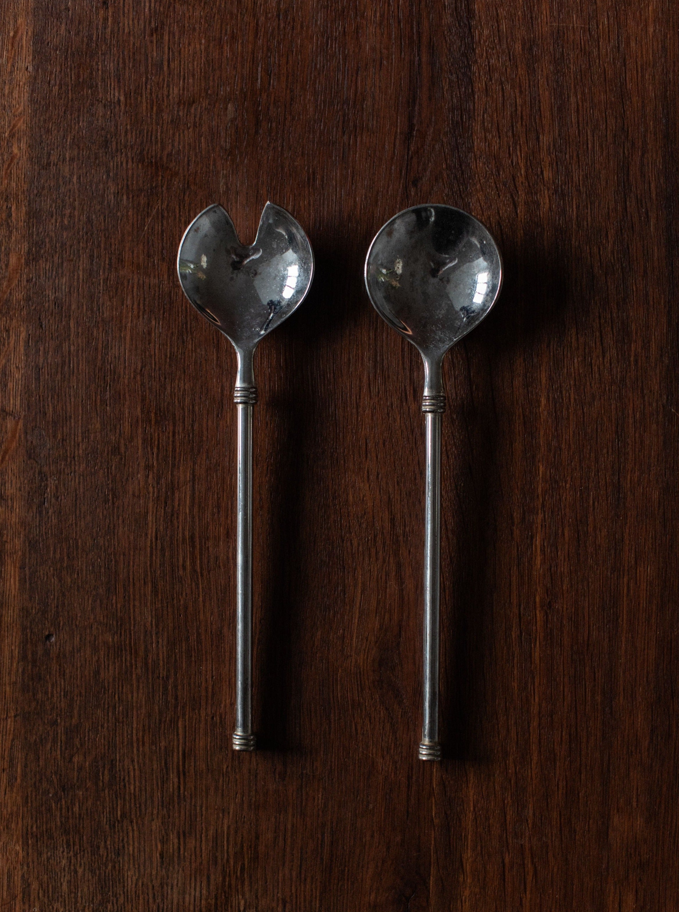 Art-Deco-inspired stainless steel cutlery set with geometric handles and sleek design