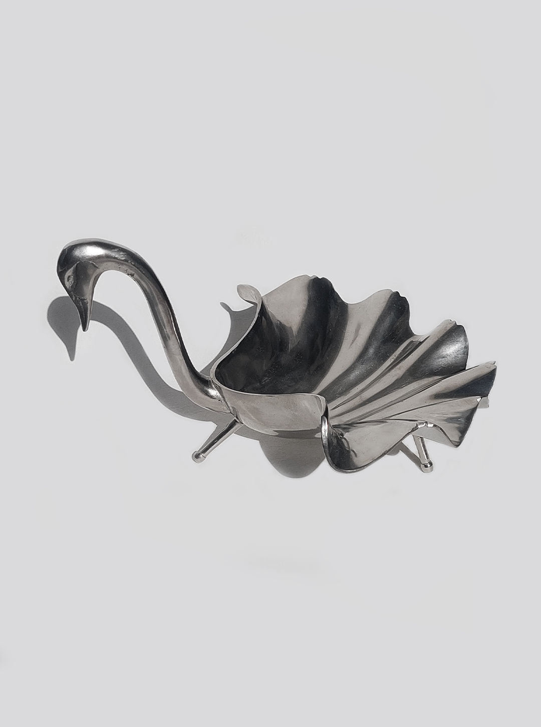 Swan & Shell Vide-Poche on marble tabletop with jewelry and keys