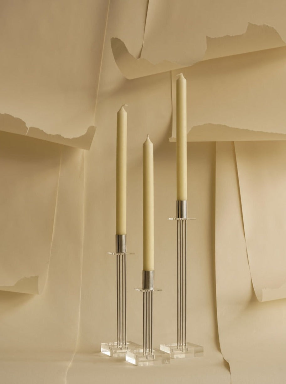 Sleek Candle Holder Set in modern black metal with geometric design and glass hurricane cover, perfect for adding elegance to any space