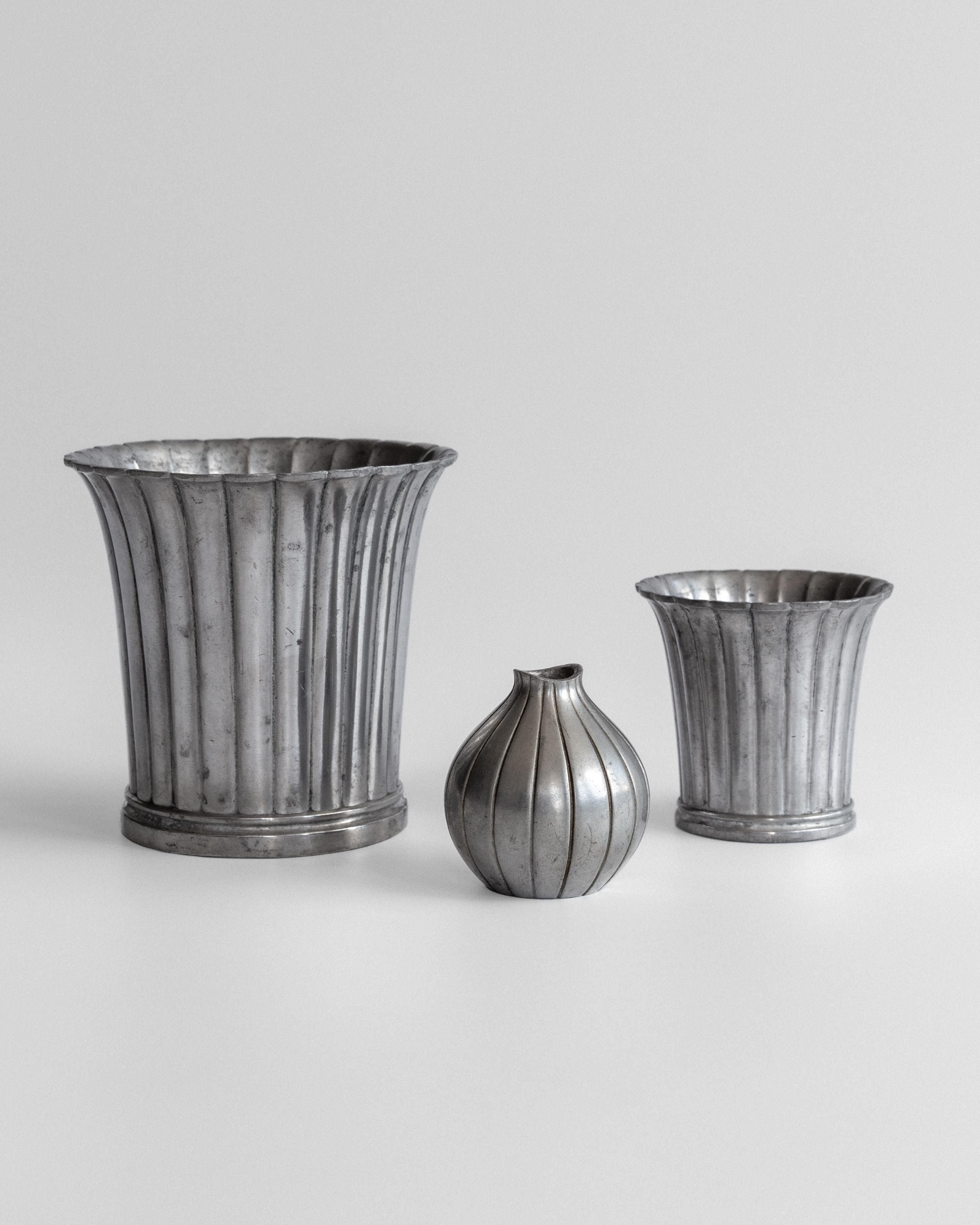 Three vintage Just Andersen pewter vases with ribbed design, 1930s-40s