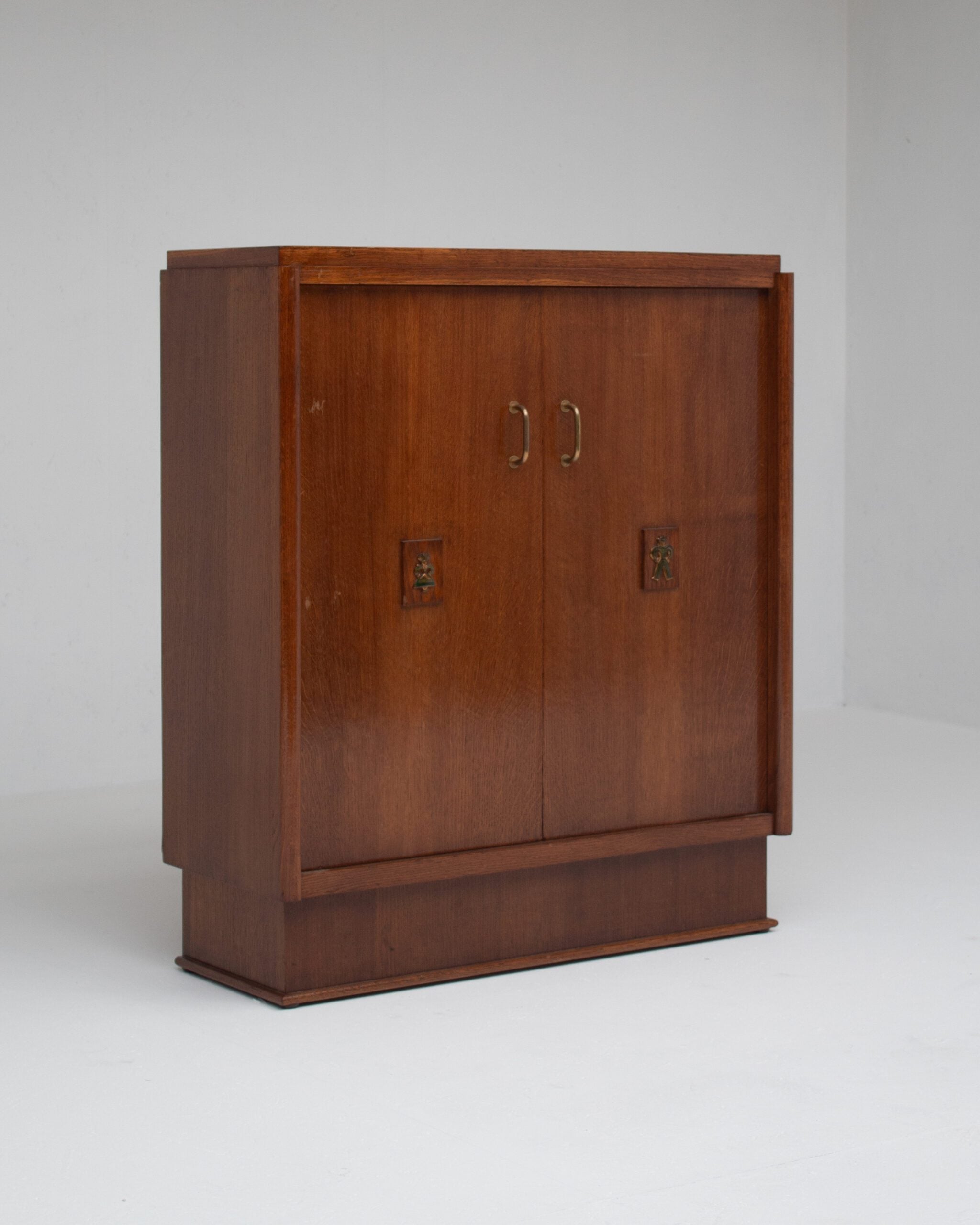 Mid-Century Oak Cabinet with Brass Handles and Decorative Inlays by Malata Antwerp | The Oblist