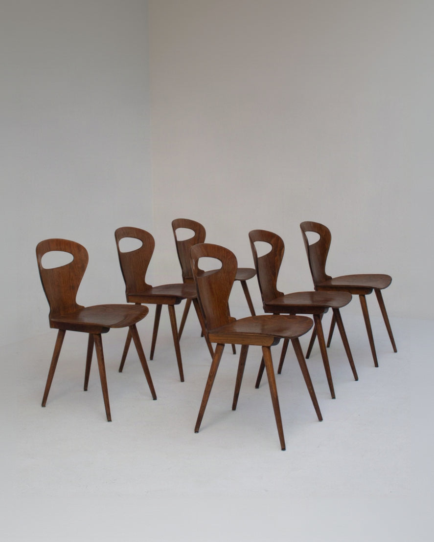 Set of Six Sculptural Wooden Dining Chairs — detail view