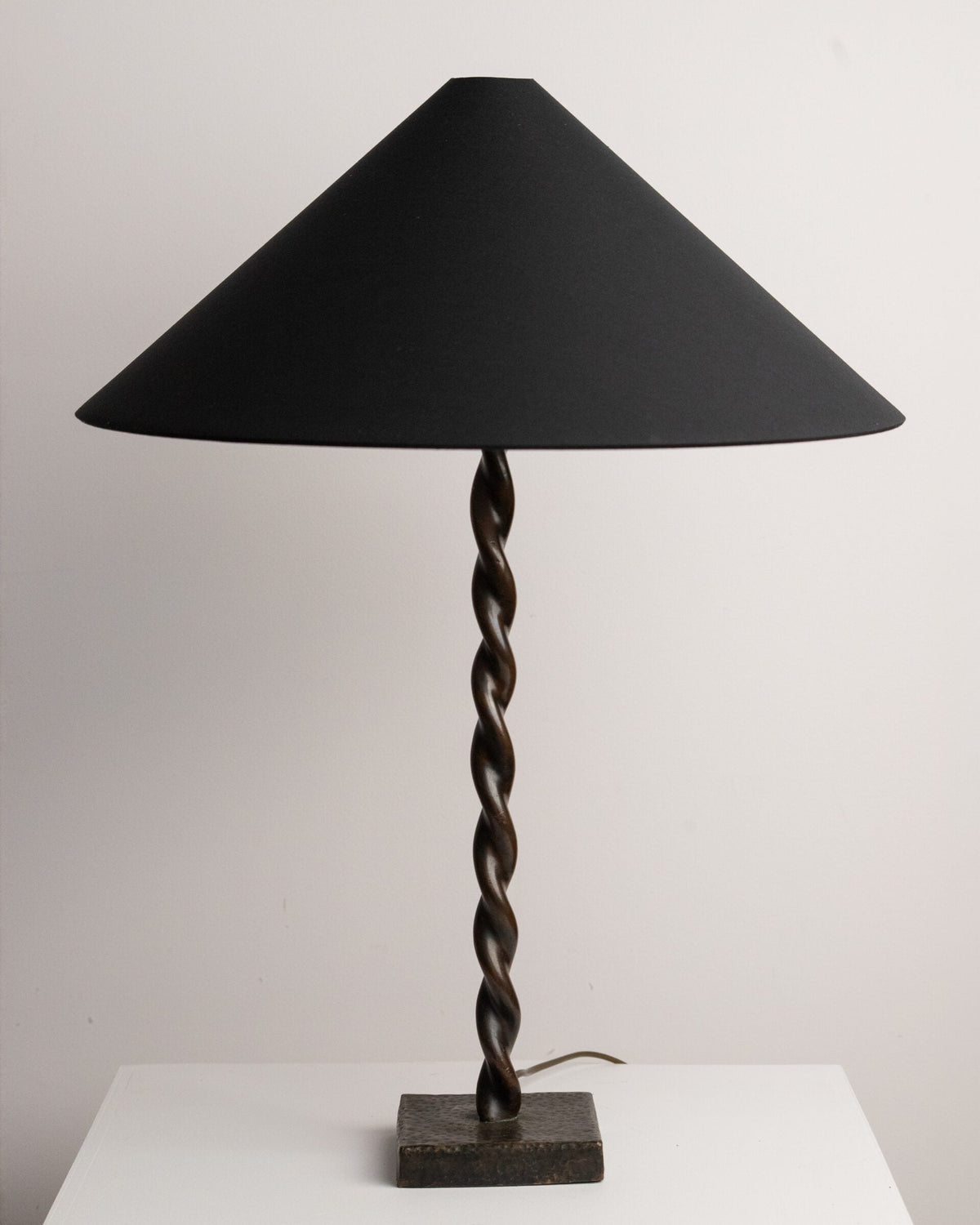 Hand-Twisted Copper Table Lamp on Hammered Plinth with Black Cone Shade, Northern European Workshop, 1960s by Studio Ecubed