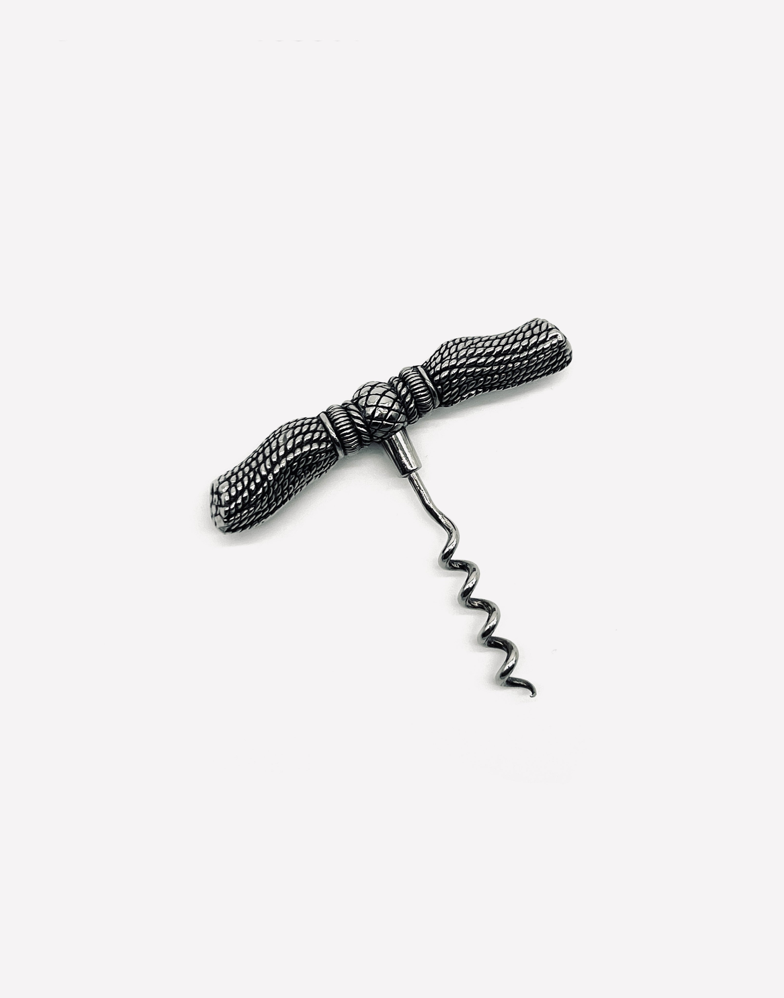 Vintage silver-plated corkscrew with decorative tassel handle