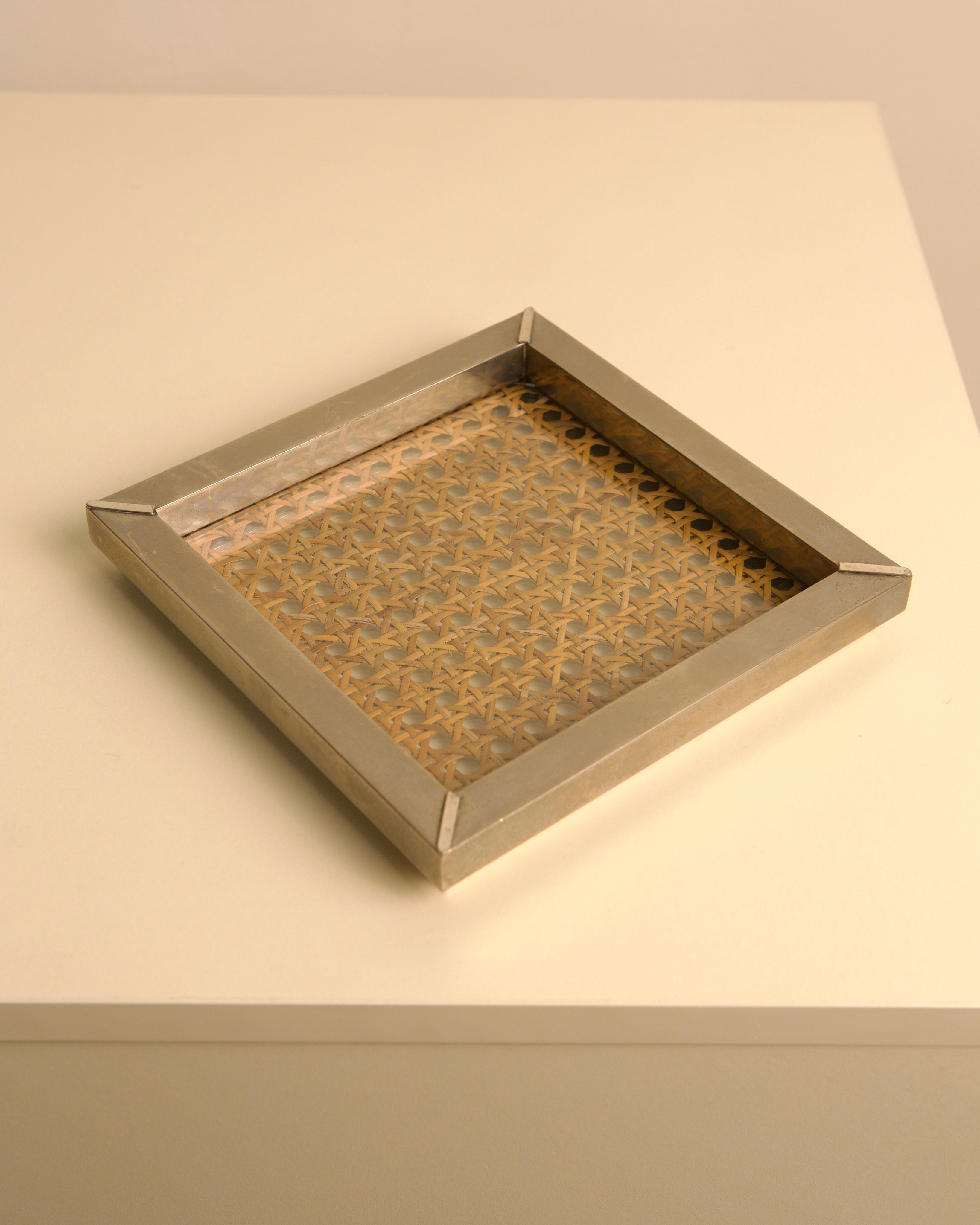 Italian 70s square metal vide-poche with woven cane insert