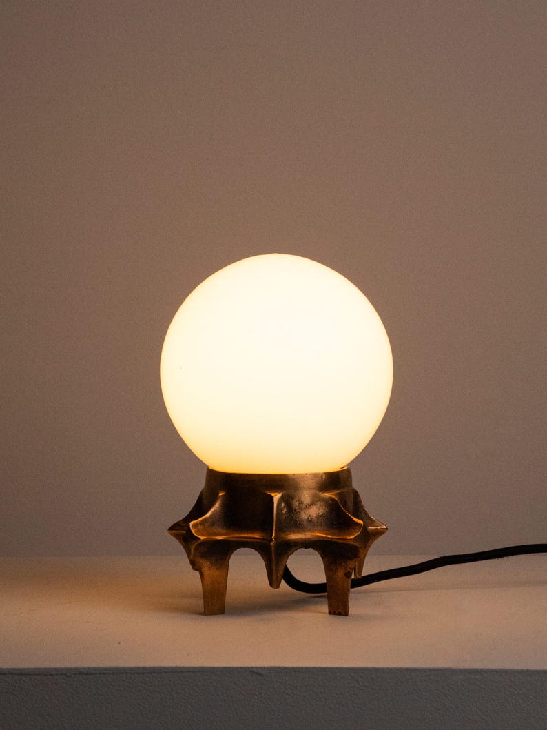 Brutalist Table Lamp, Tripod Cast Metal Base, Opaline Glass Globe Shade, 1970s — side angle
