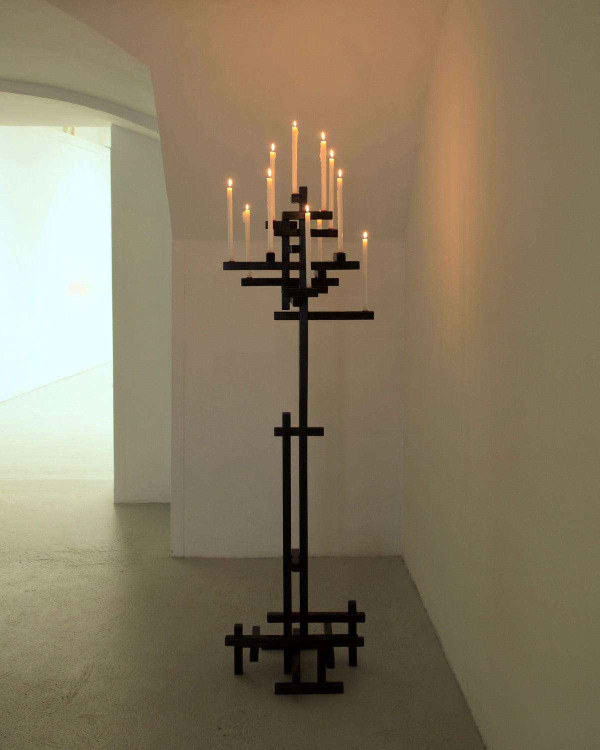 TETRIS CANDELABRUM — black metal candelabrum in minimalist gallery setting