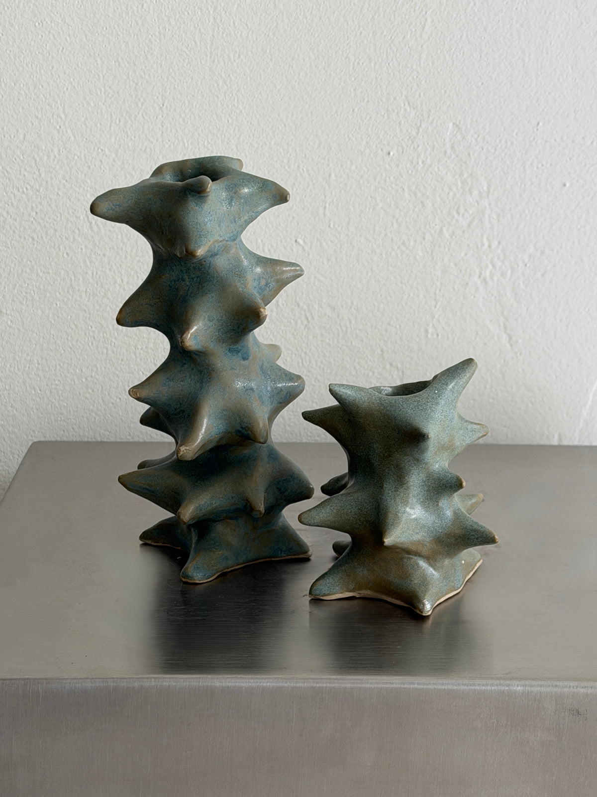 Pair of Candle Holders in green ceramic by 2222Studio | The Oblist
