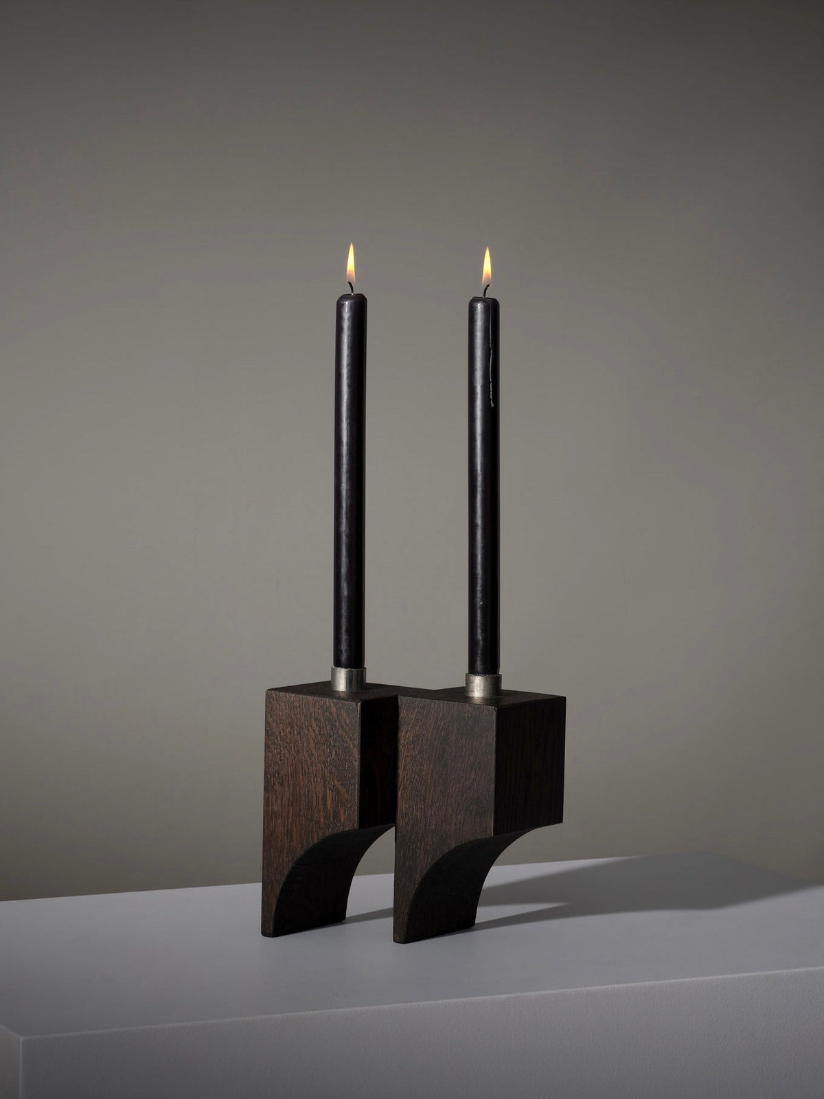 Acer Candle Holder R:2 — angled view of dark wood with black candles
