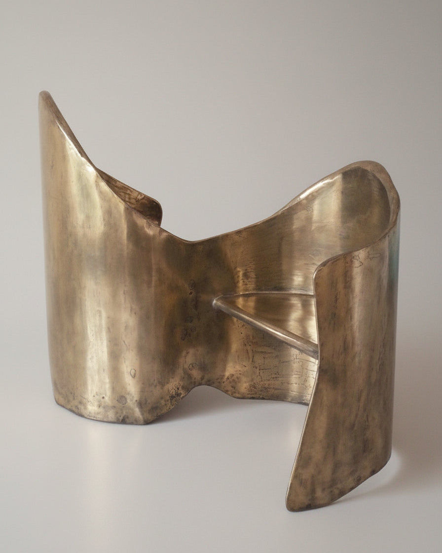 Sculptural bronze metal loveseat with curved flowing form by Atelier Ellery