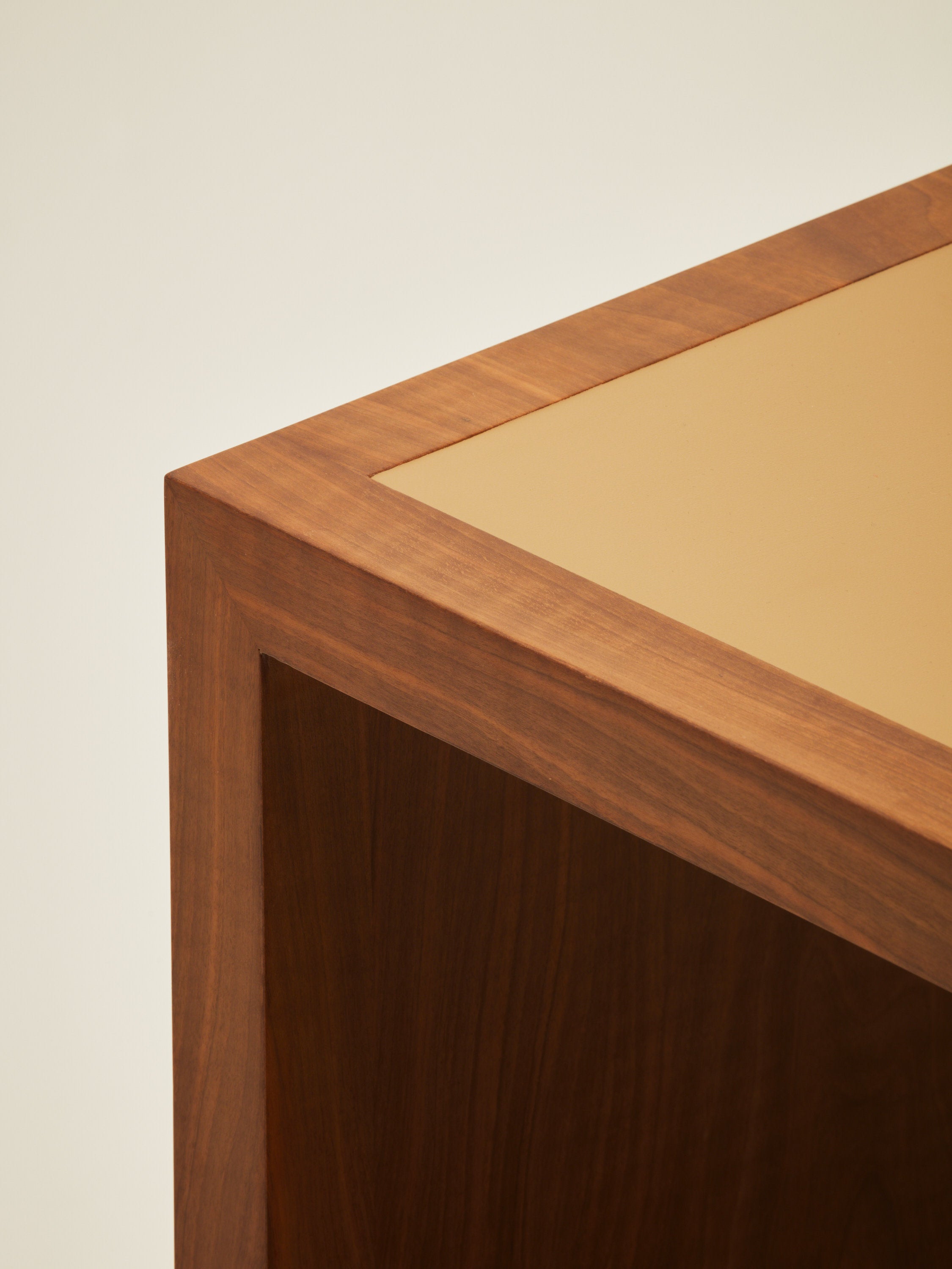 'Continuous' Desk Handcrafted in Wood Veneer With a Lether Tabletop & Travertine Leg — detail view