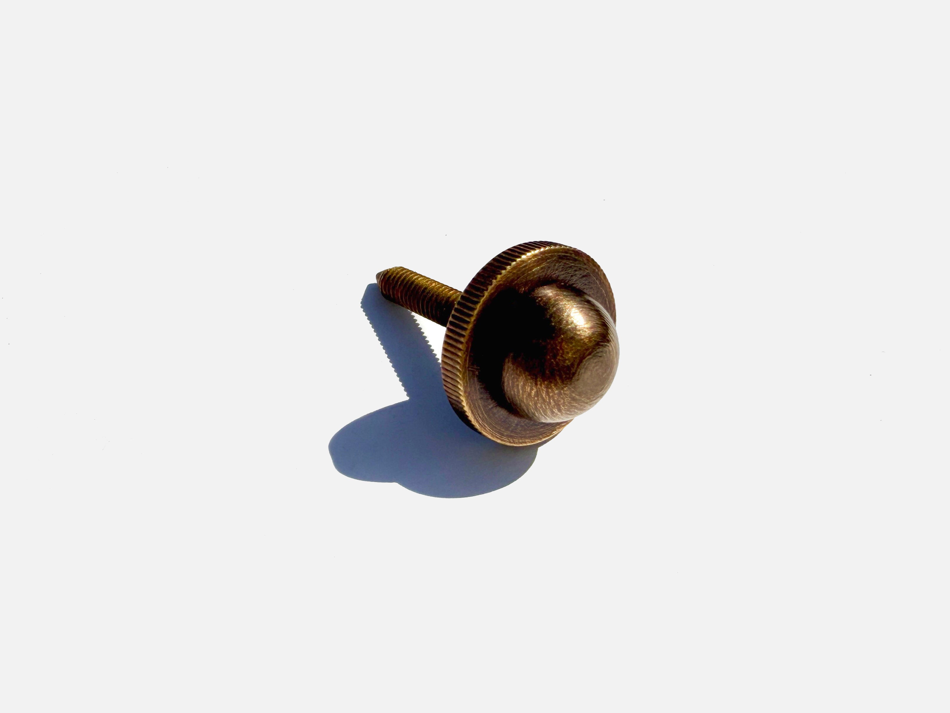 Selene Blown Glass Quartz Wall LED Wall Sconce with Brass Metal Hardware — close-up of brass hardware detail