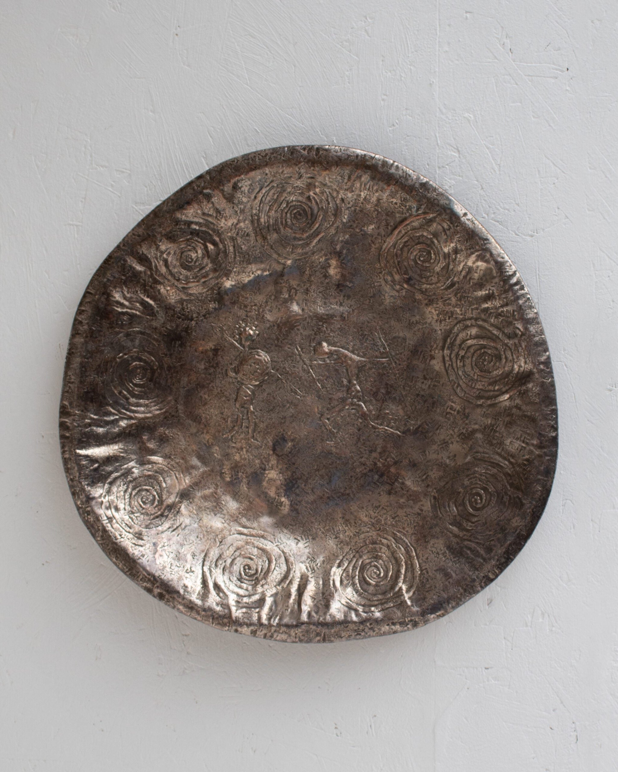 Bragalini Wall Art with Spiral Relief Motif in Hammered Metal by Malata Antwerp | The Oblist
