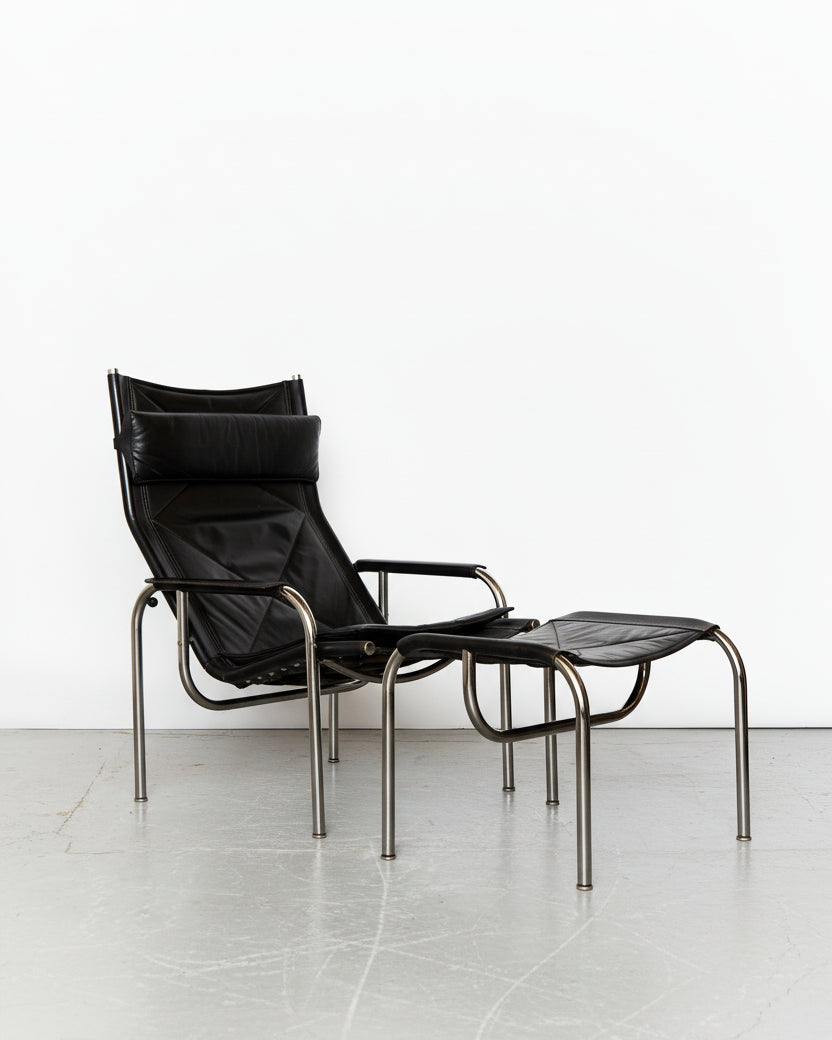 Hans Eichenberger Lounge Chair & Ottomane HE1106 for Strässle by Eilers Interieur | The Oblist — black leather, modern design