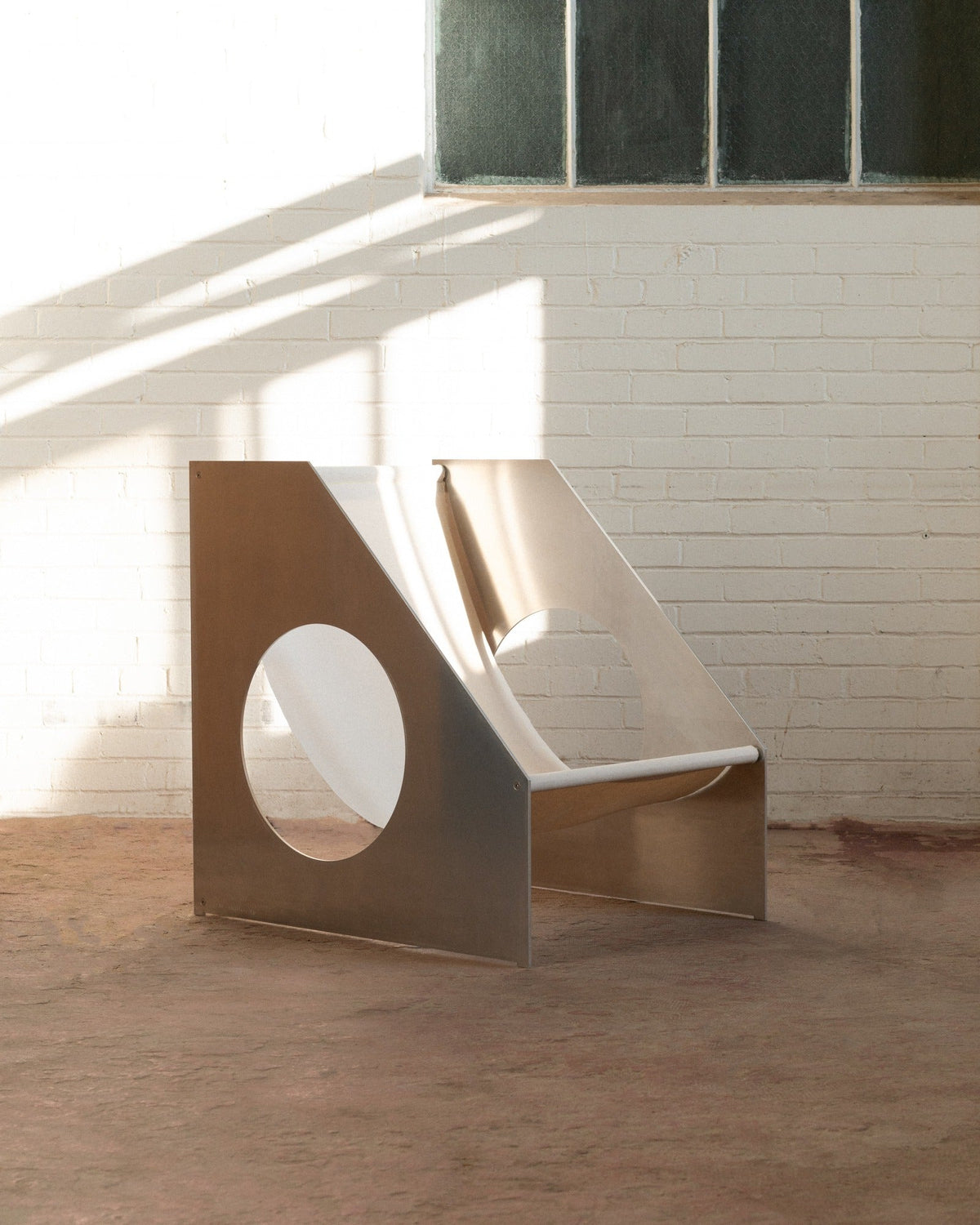 Aluminium Hublot Chair by LE CHATELIER | The Oblist