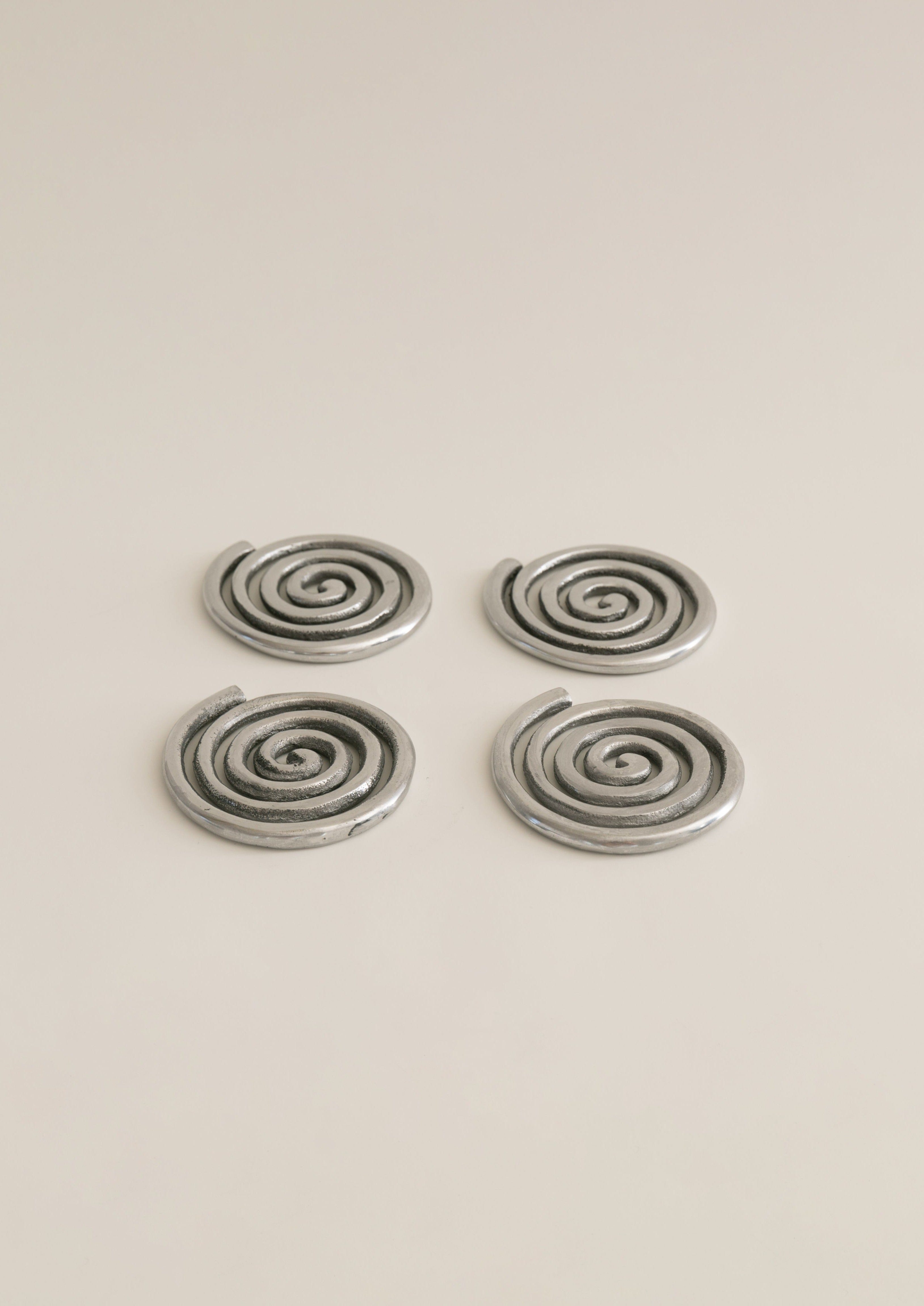 Spiral coasters set of 4 – nickel-plated aluminum by Sophie Lou Jacobsen