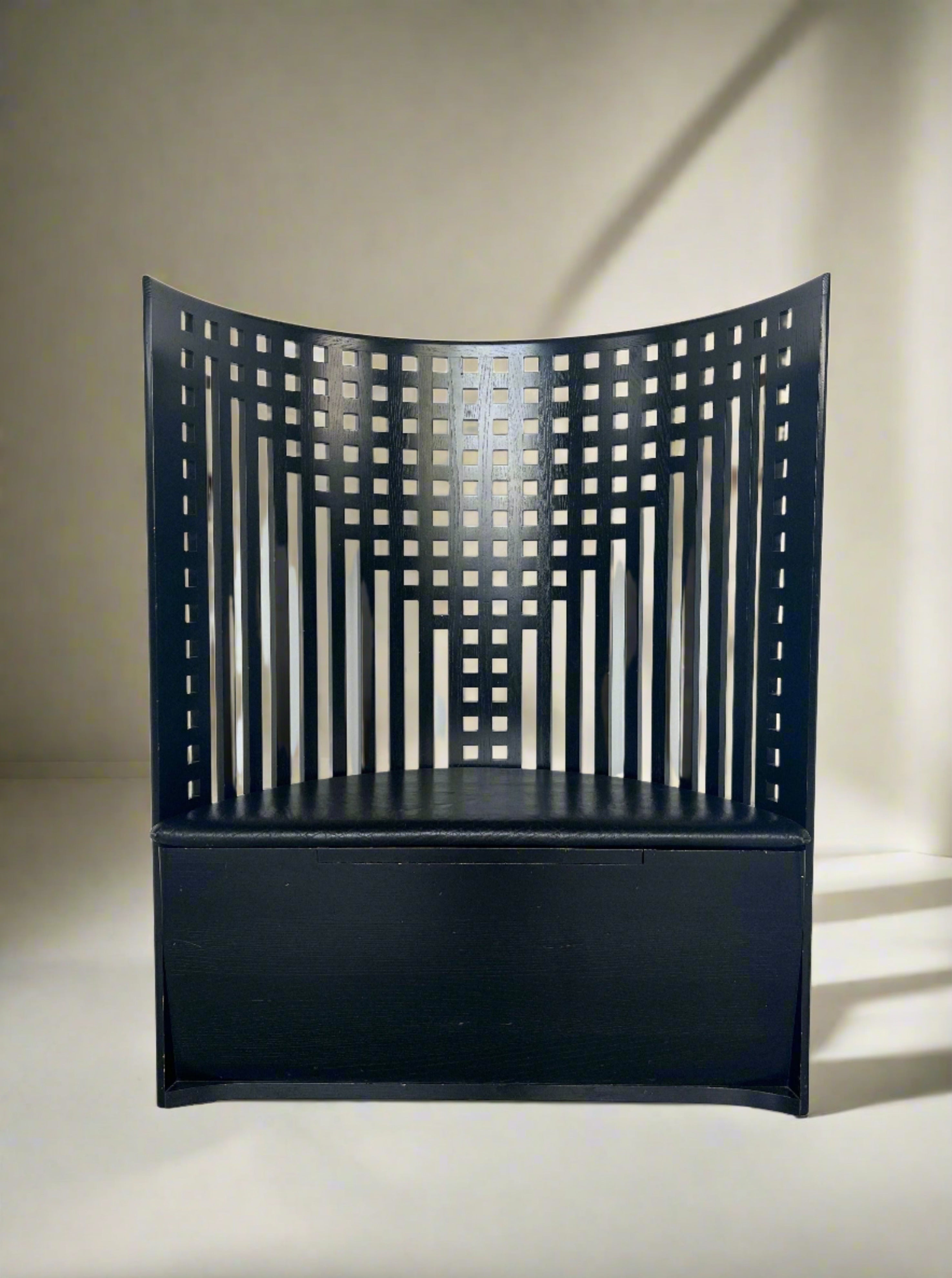 Willow Bench by Charles Rennie Mackintosh, a classic and elegant furniture piece, featuring intricate wooden details and a curved design