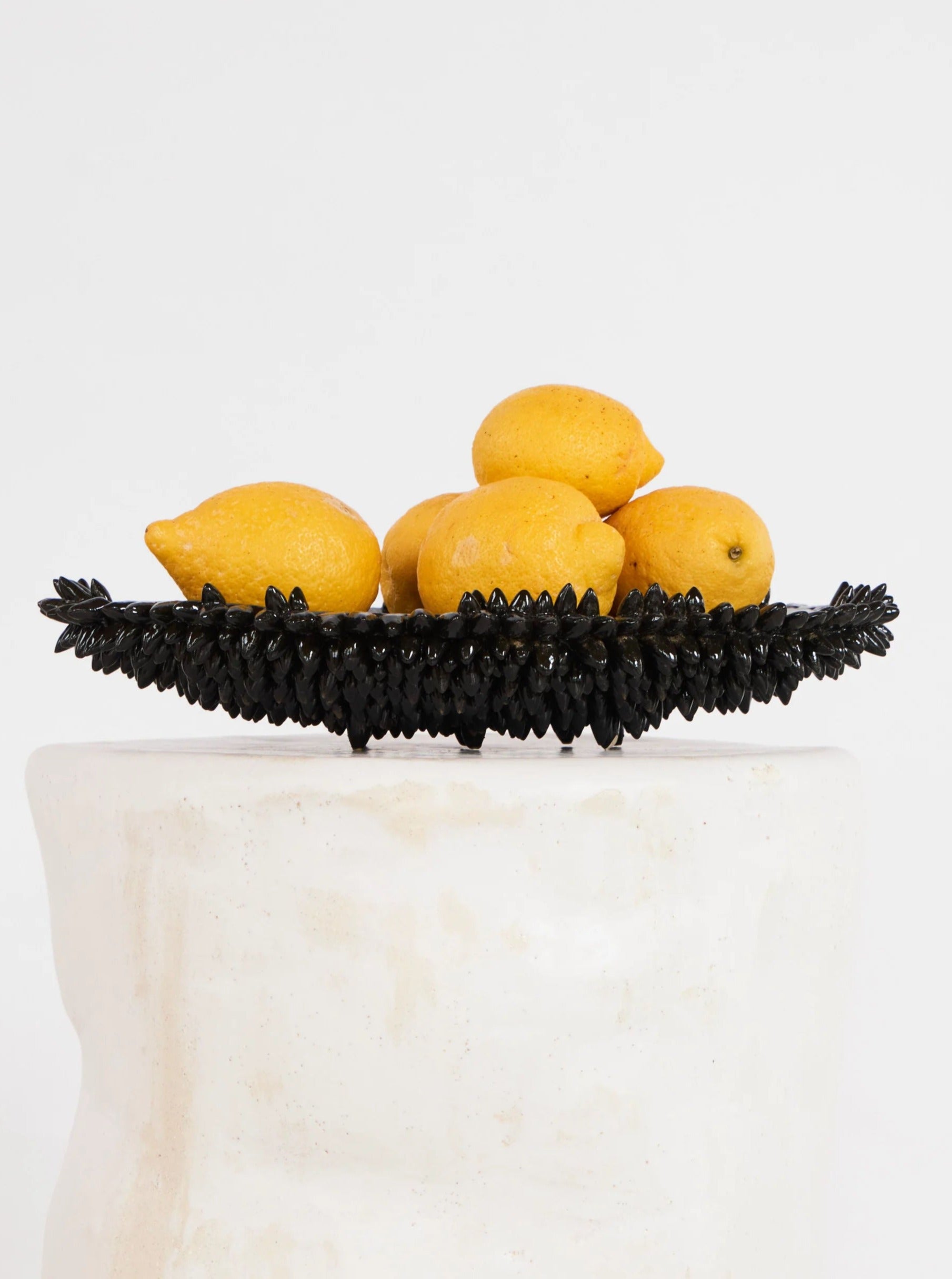 Handcrafted ceramic Appuntito Plate with intricate floral design and delicate blue trim