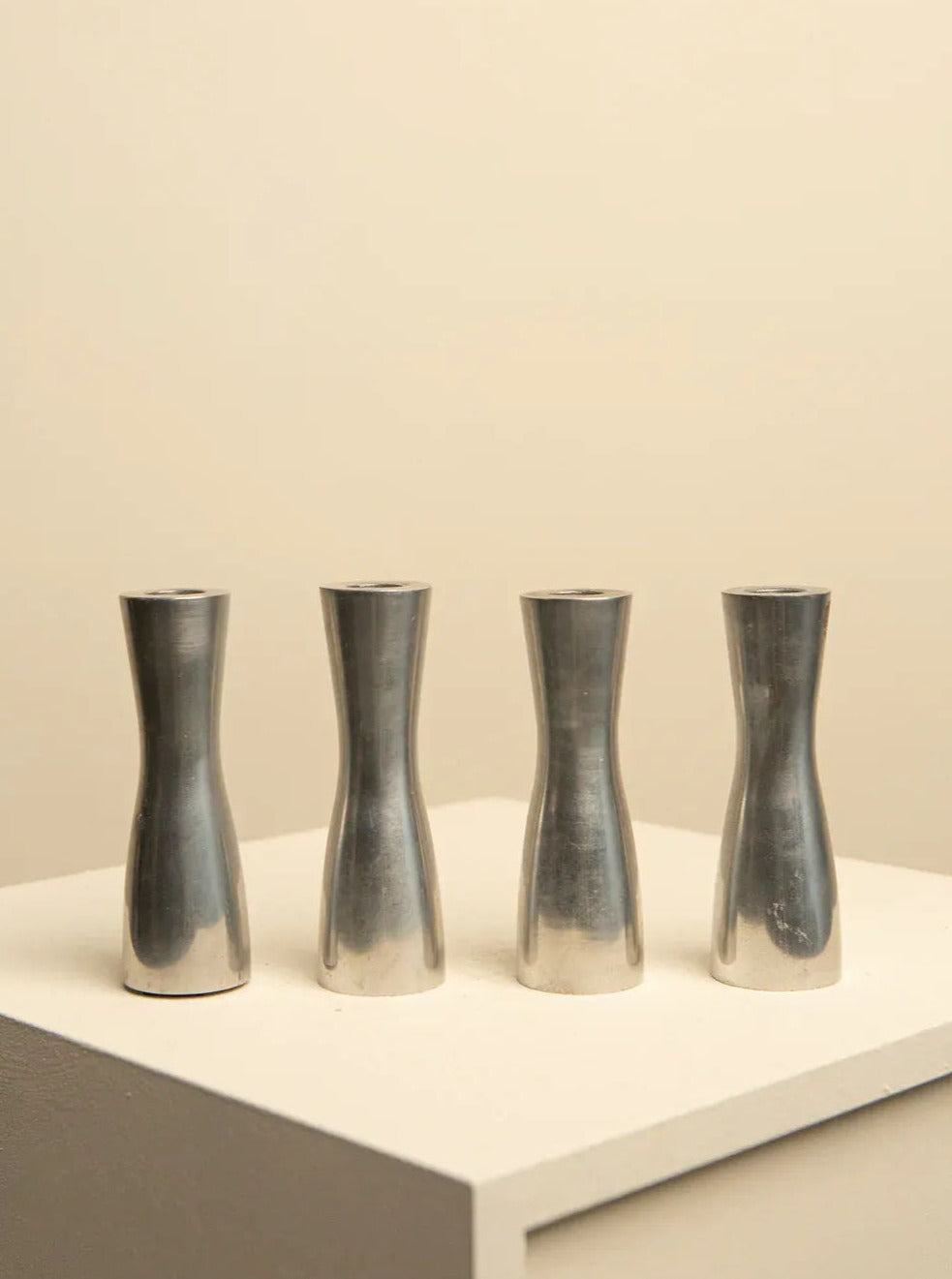 Set of 3 vintage 1990s Erika Pekkari chrome-plated candleholders, stylish and elegant home decor accents