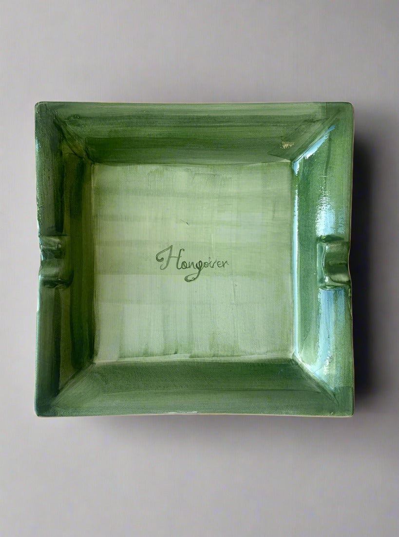 Hangover Ashtray with a comical design of a hungover face