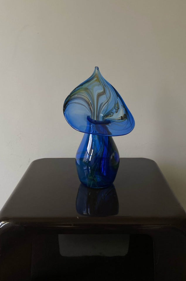 Beautiful handcrafted mouthblown glass vase with elegant curves and unique texture