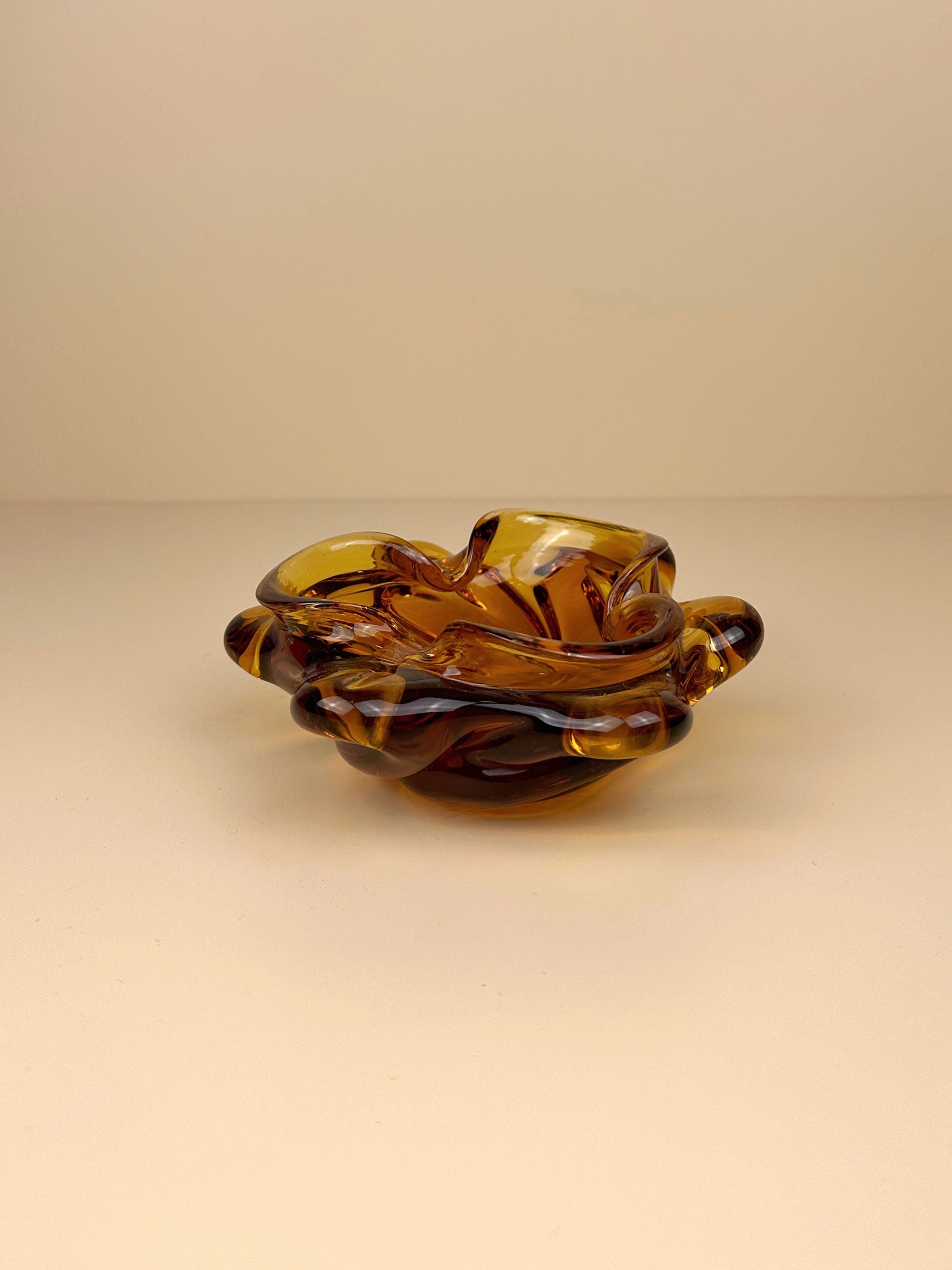 Vintage 1970s Bohemian amber glass ashtray with intricate floral designs