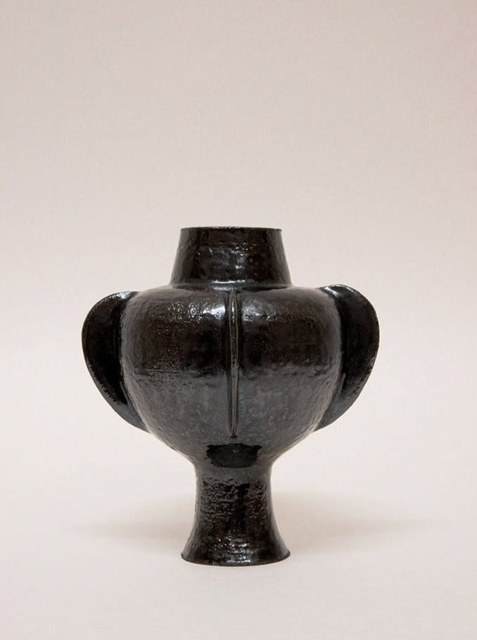 Beautiful ceramic vase with a unique glaze finish and elegant shape