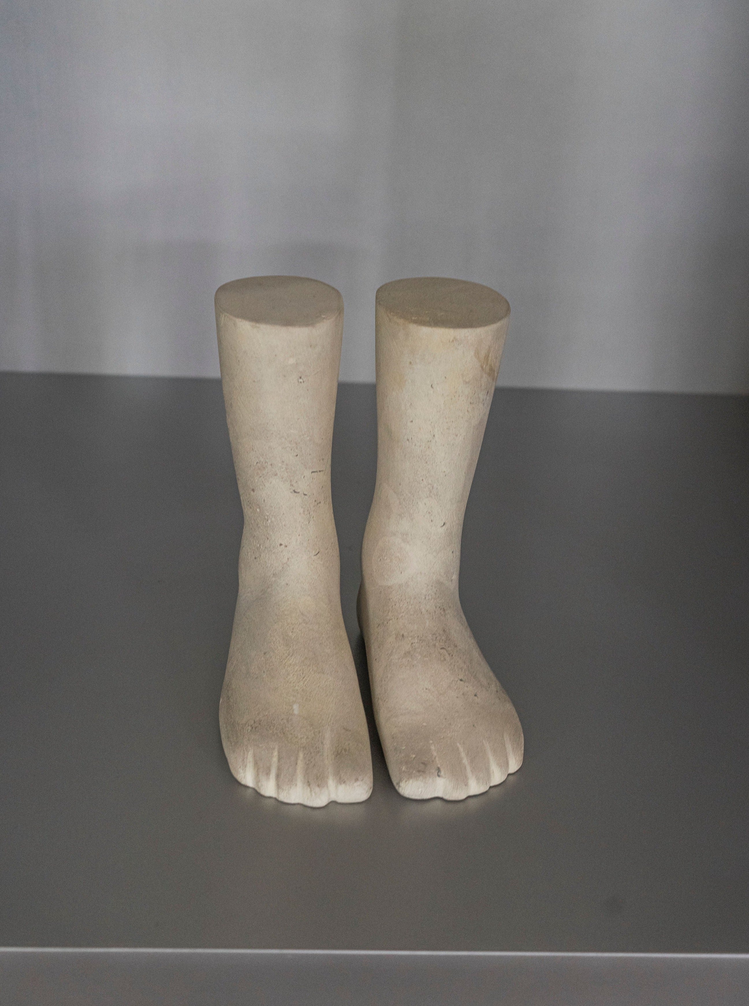 Hand-carved stone feet sculpture, a unique and intricate work of art