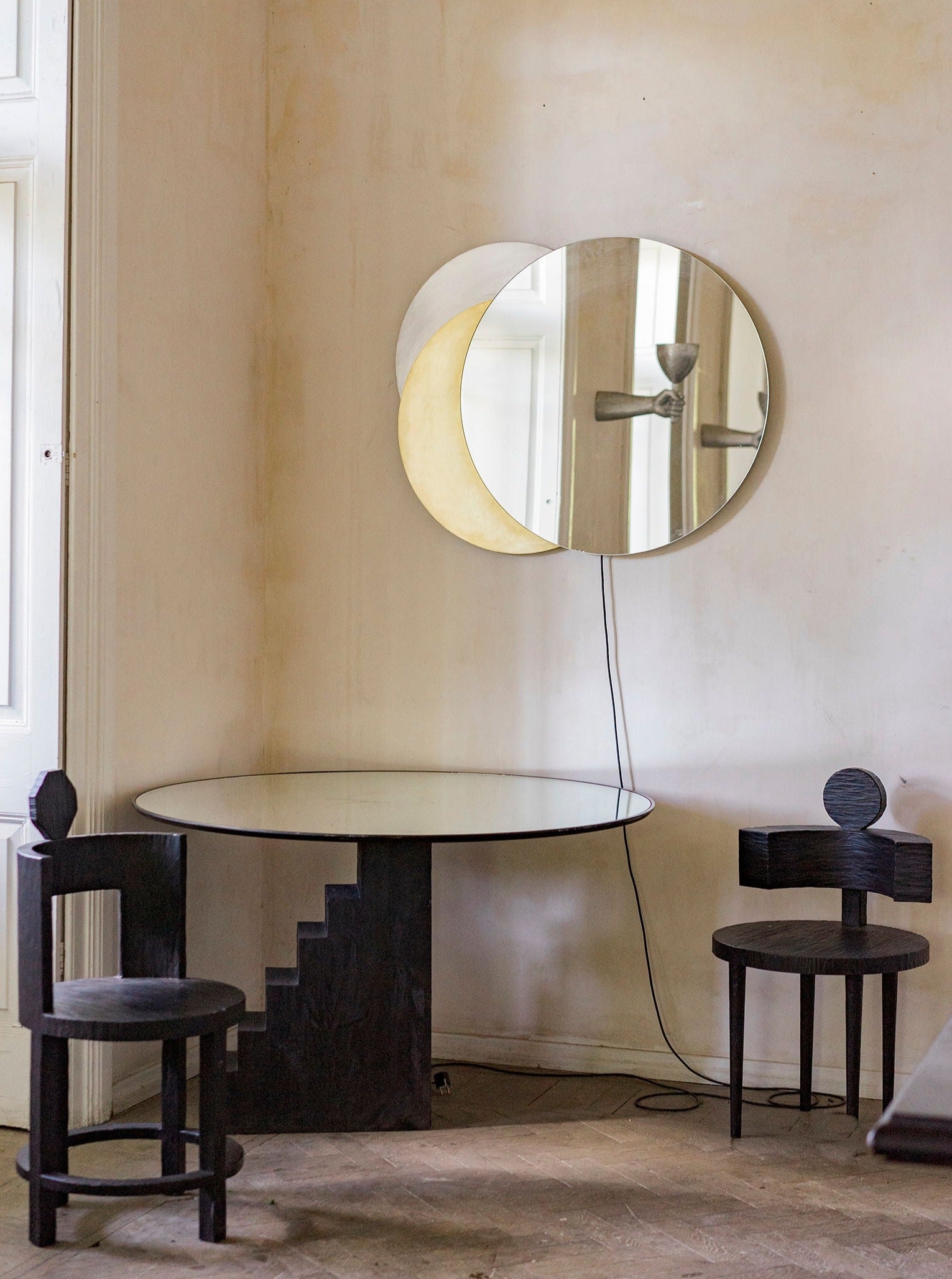 Modern stainless steel Eclipse Mirror with round design and LED lighting