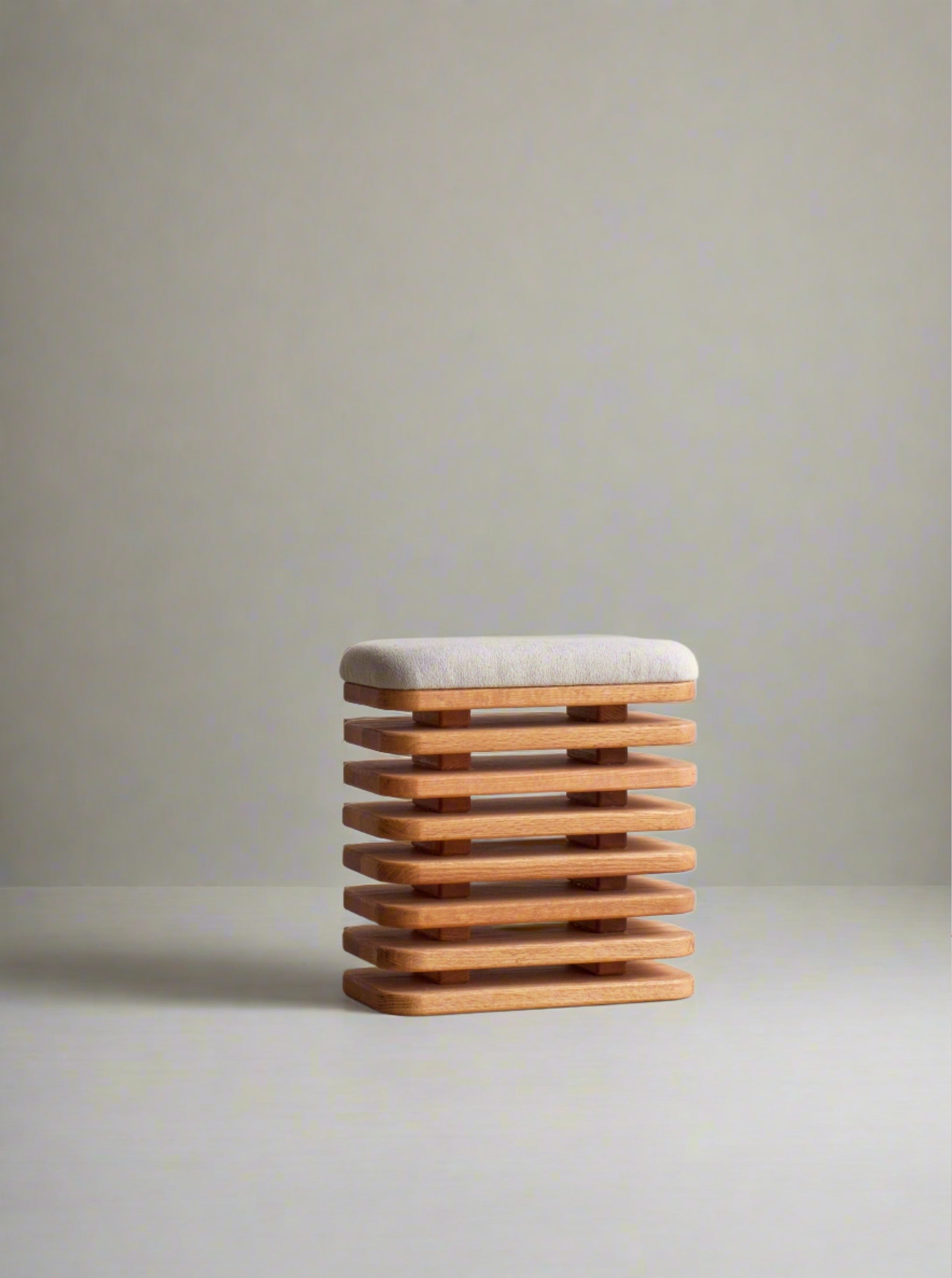 Ushigome-Yanagichio stool in natural wood with curved legs and woven seat