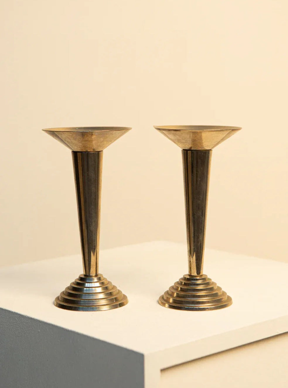 Vintage pair of Italian Art Deco candleholders, featuring intricate design and ornate details from the 1980s