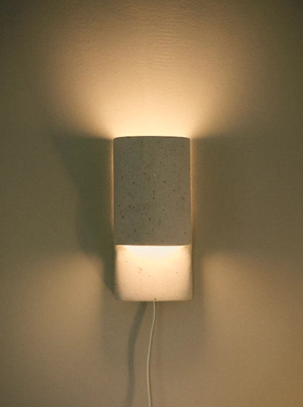 Contemporary natural white wall light with sleek design and soft illumination