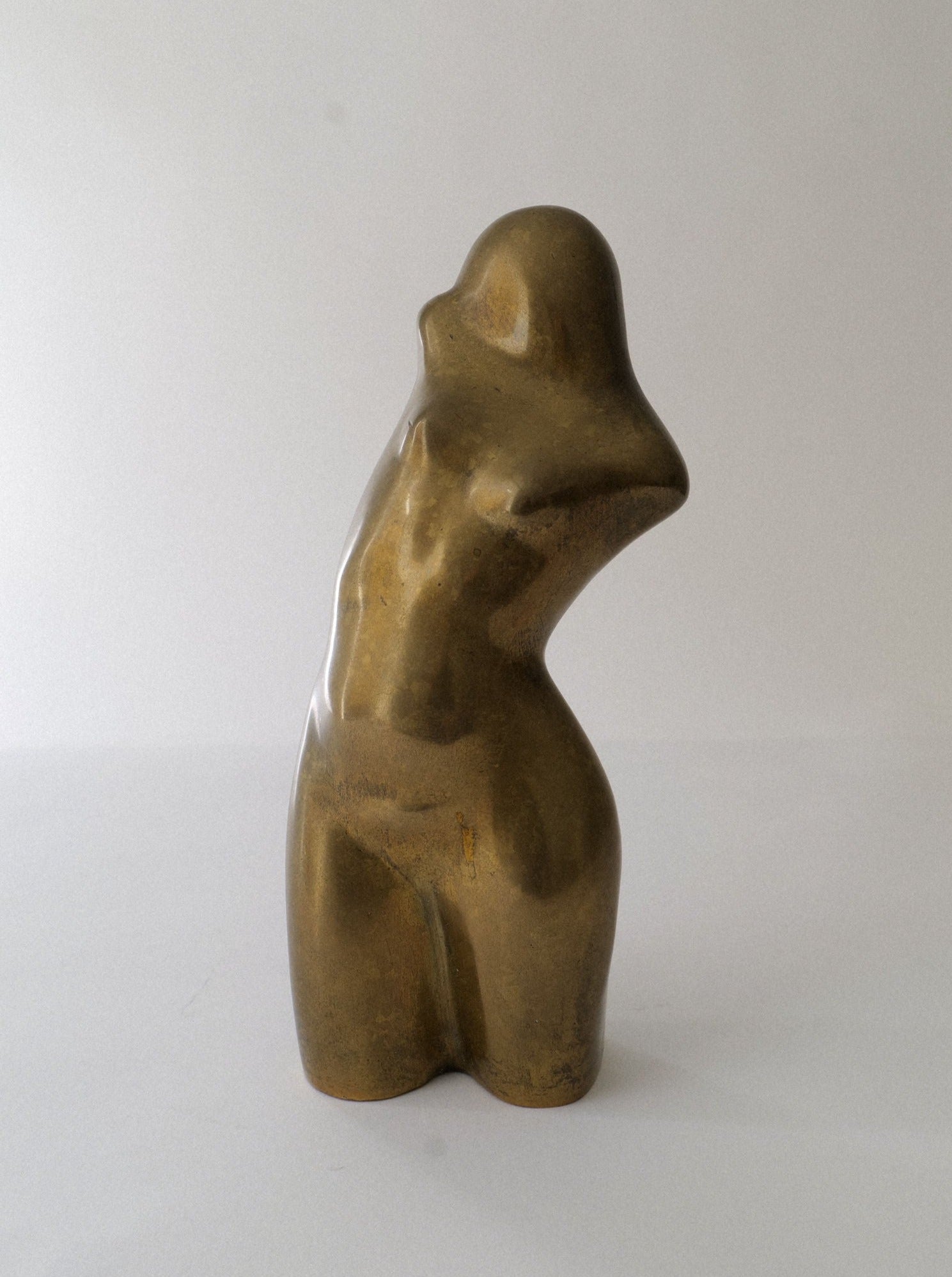 Bronze figurine sculpture of a dancing woman in graceful pose