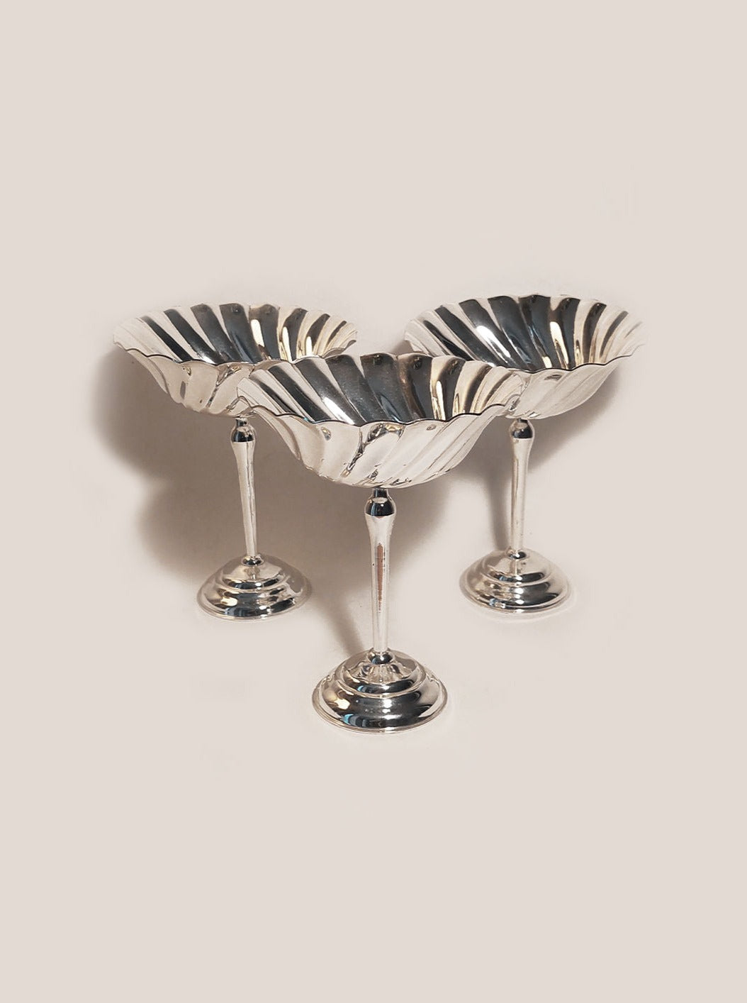 Set of 3 elegant silver-plated dessert cups with intricate design
