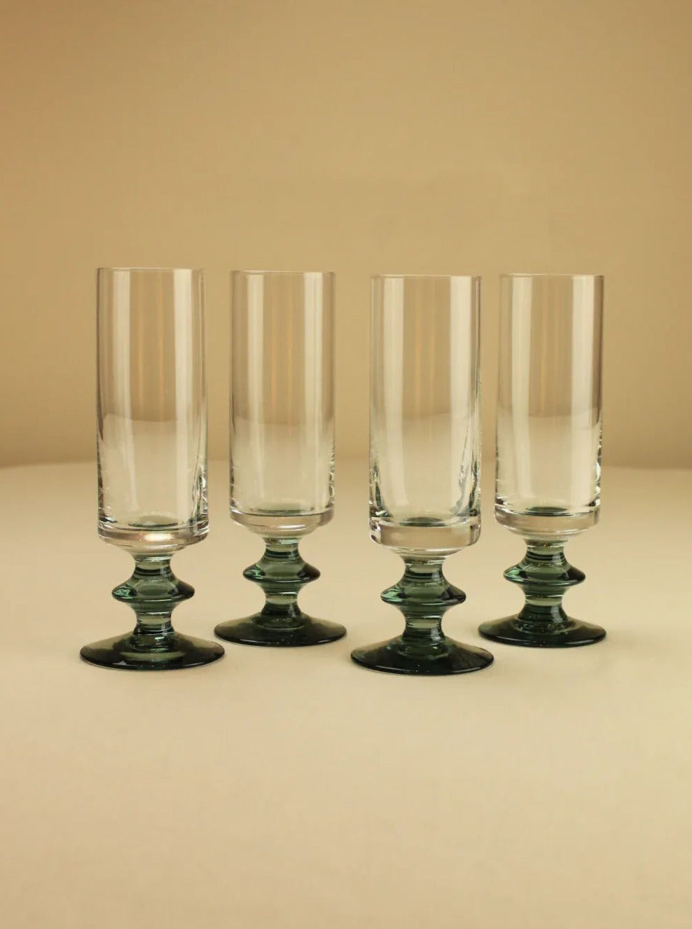 Set of six elegant champagne flutes with delicate stem and bowl