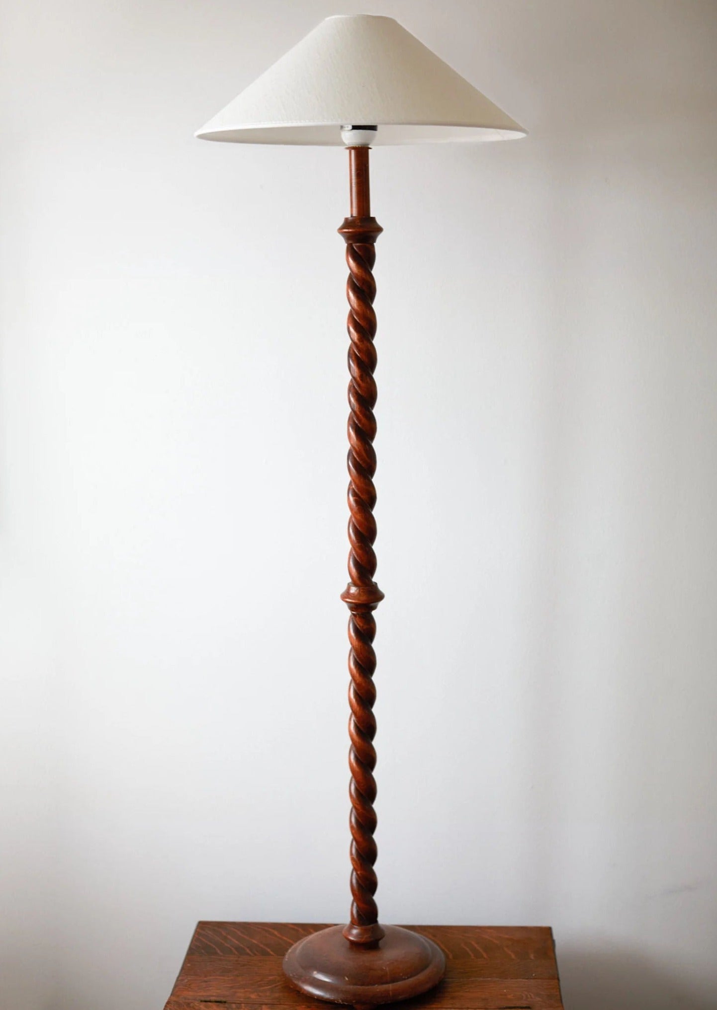 Modern wooden floor lamp with white fabric shade and adjustable arm