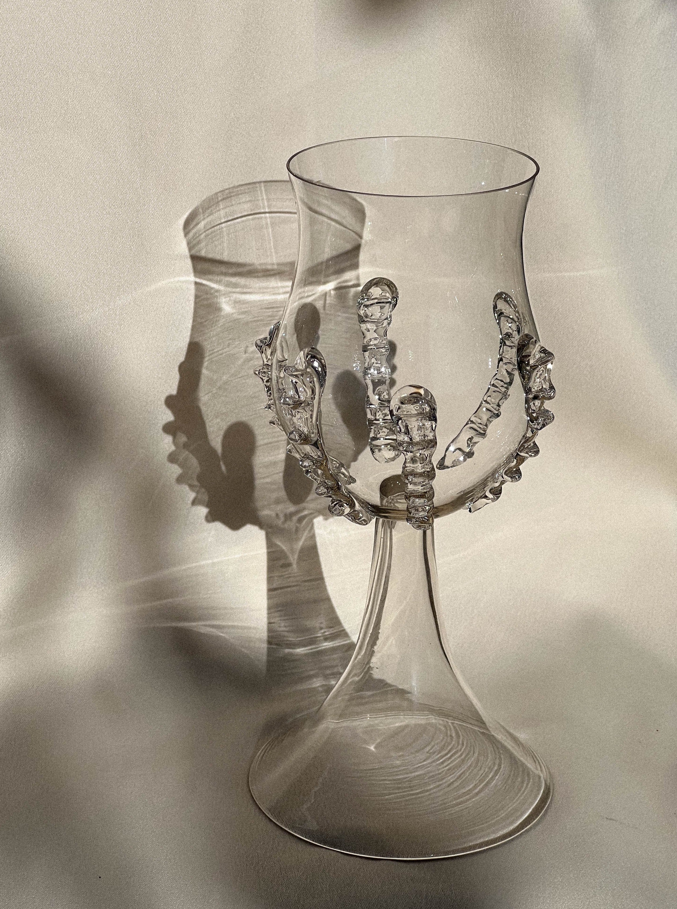 Mouthblown wine goblet with ribbed design and elegant stem
