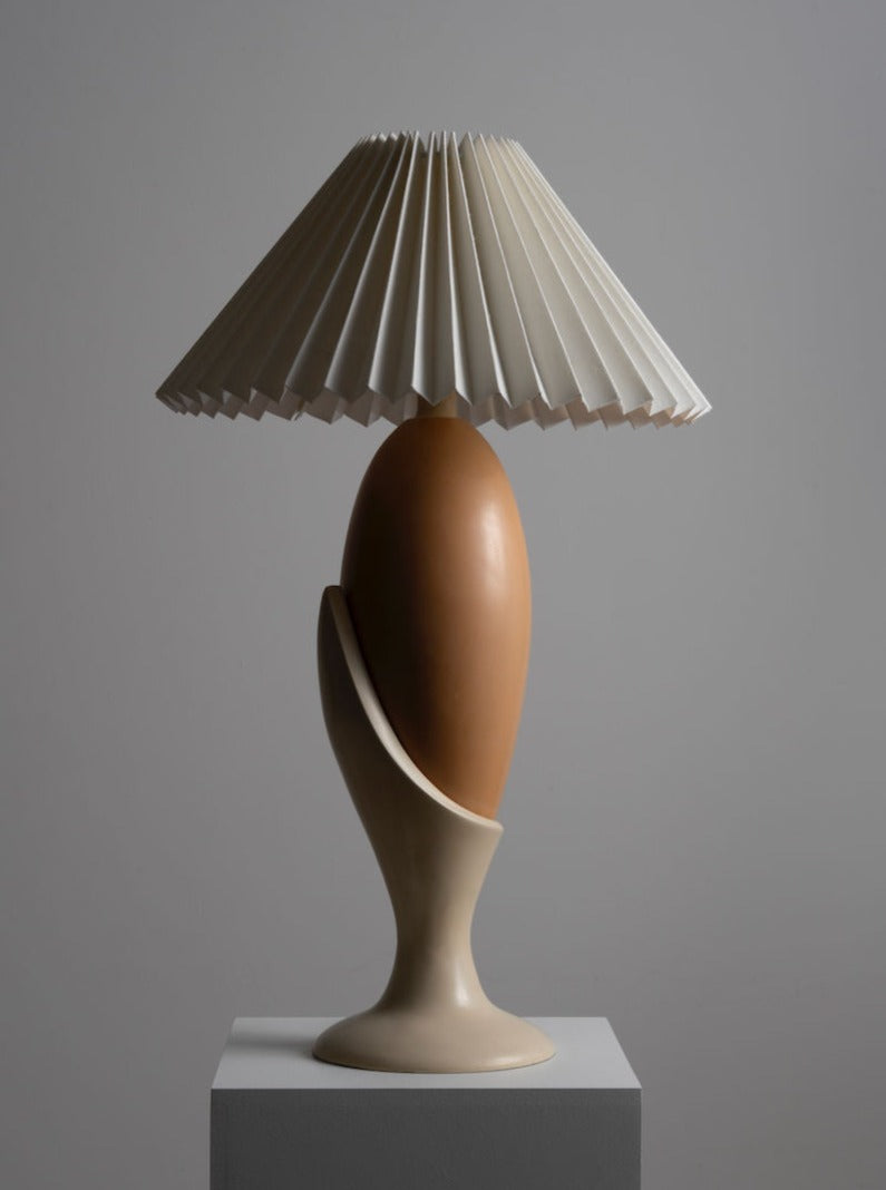 Vintage-inspired Art Deco table lamp with frosted glass shade and brass base