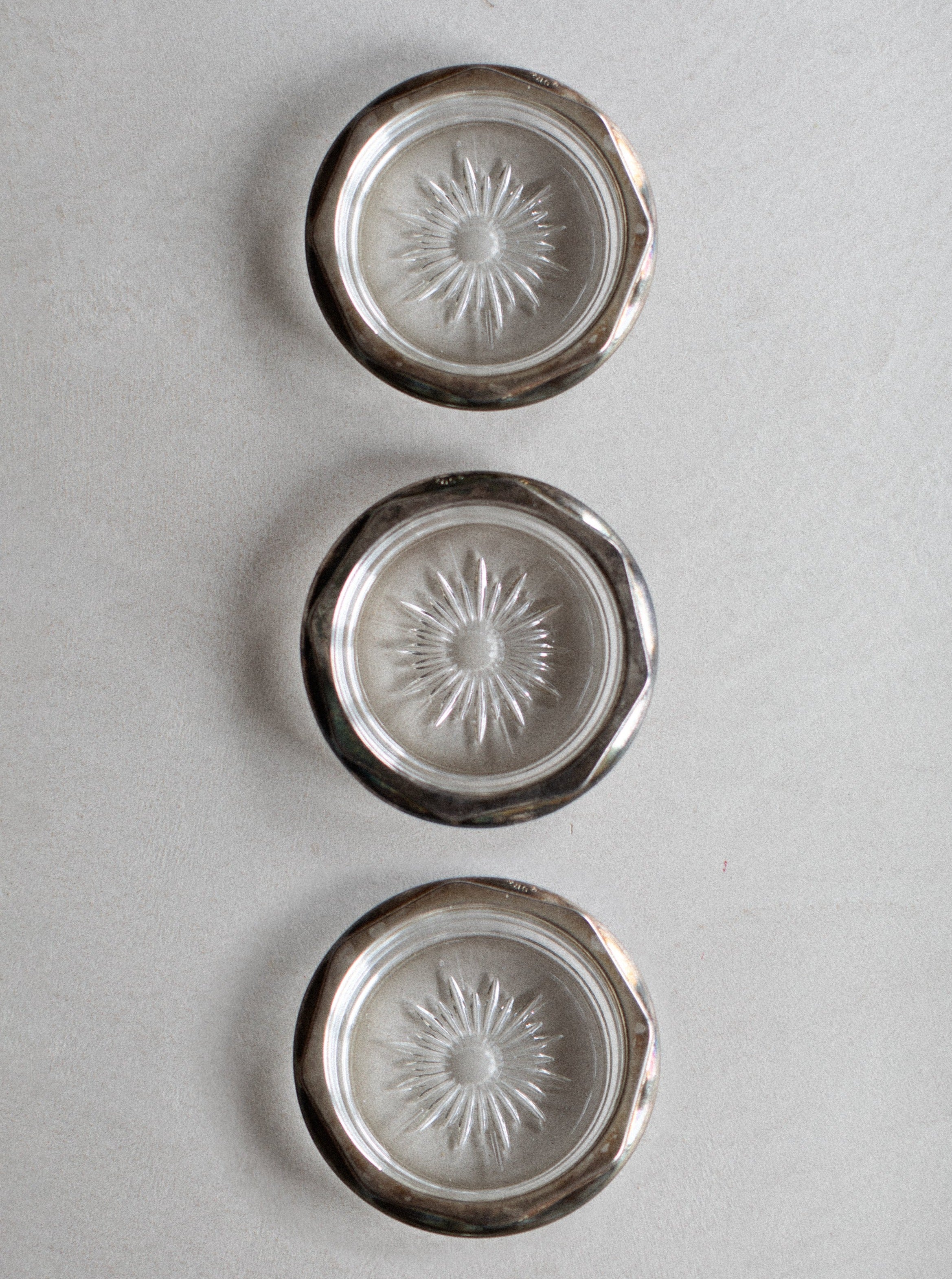 Glass coasters with elegant floral design and gold accents