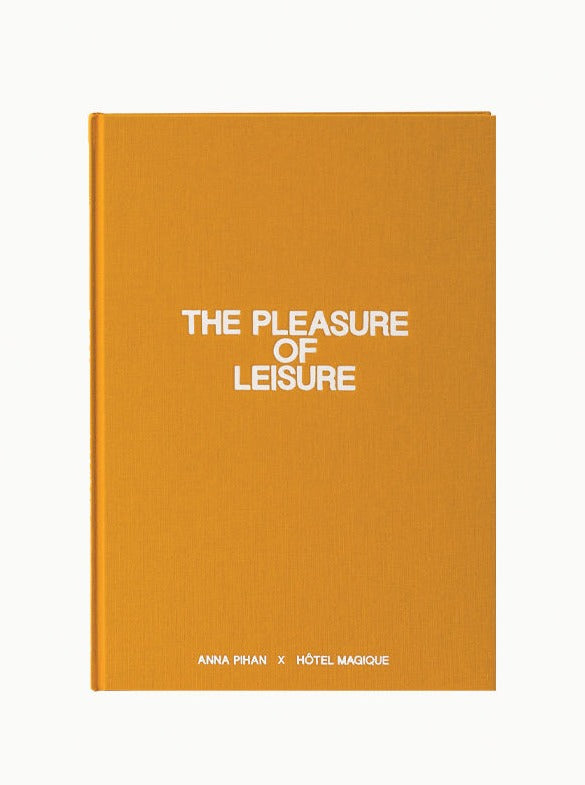 A mustard-colored book titled "The Pleasure of Leisure," featuring white text on the cover. At the bottom, authors Anna Pihan and Maison Plage are listed. The book cover remains simple and minimalistic, with no other designs or images.