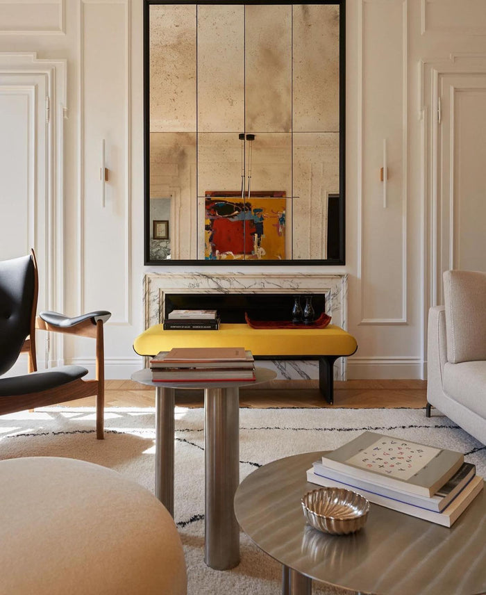 Cozy living room with layered lighting and plush seating