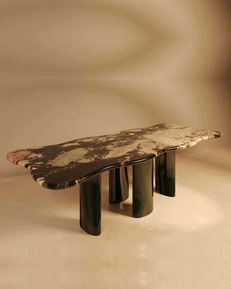MOJE marble dining table with curved edges and dark green legs